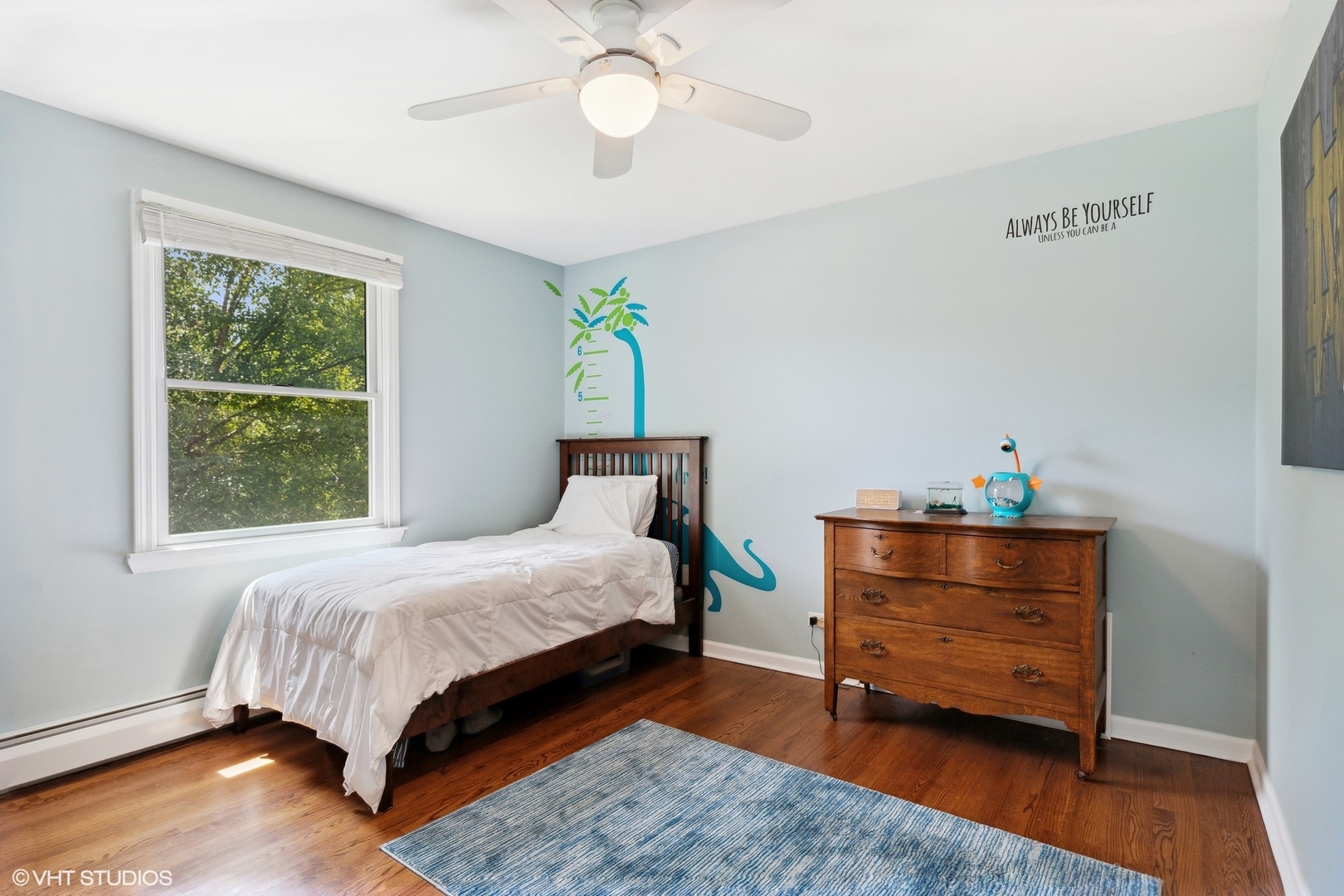 1005 Jenkisson Avenue Lake Bluff, IL 60044 - Photo 12 of 16 a bedroom with a bed and a dresser