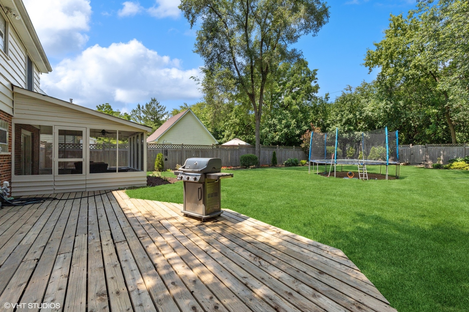1005 Jenkisson Avenue Lake Bluff, IL 60044 - Photo 14 of 16 a view of a house with backyard sitting area and garden