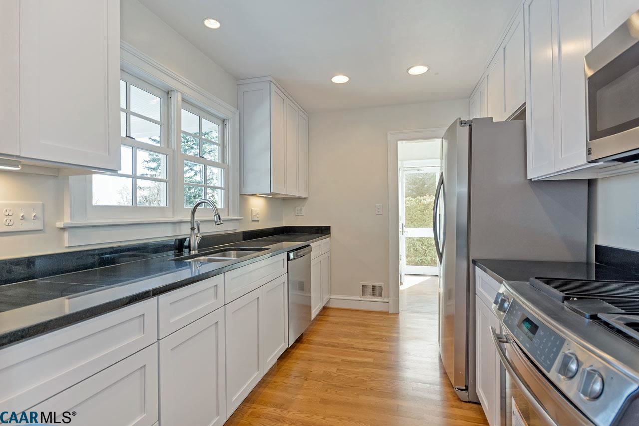 1536 Dairy Road Charlottesville, VA 22903 - Photo 11 of 37 Brand new kitchen with custom white cabinets, granite tops and high end appliances.