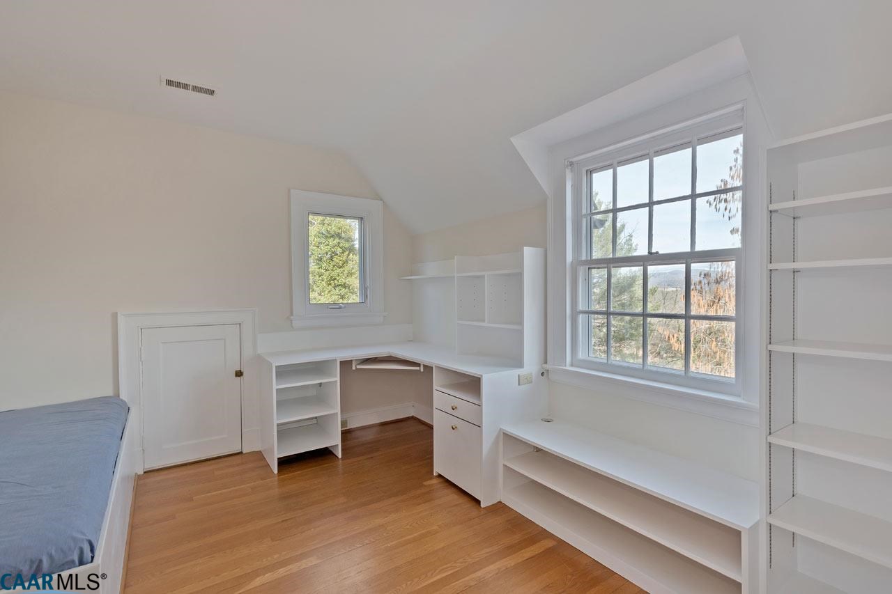 1536 Dairy Road Charlottesville, VA 22903 - Photo 25 of 37 Second bedroom with built in shelves and daybed.