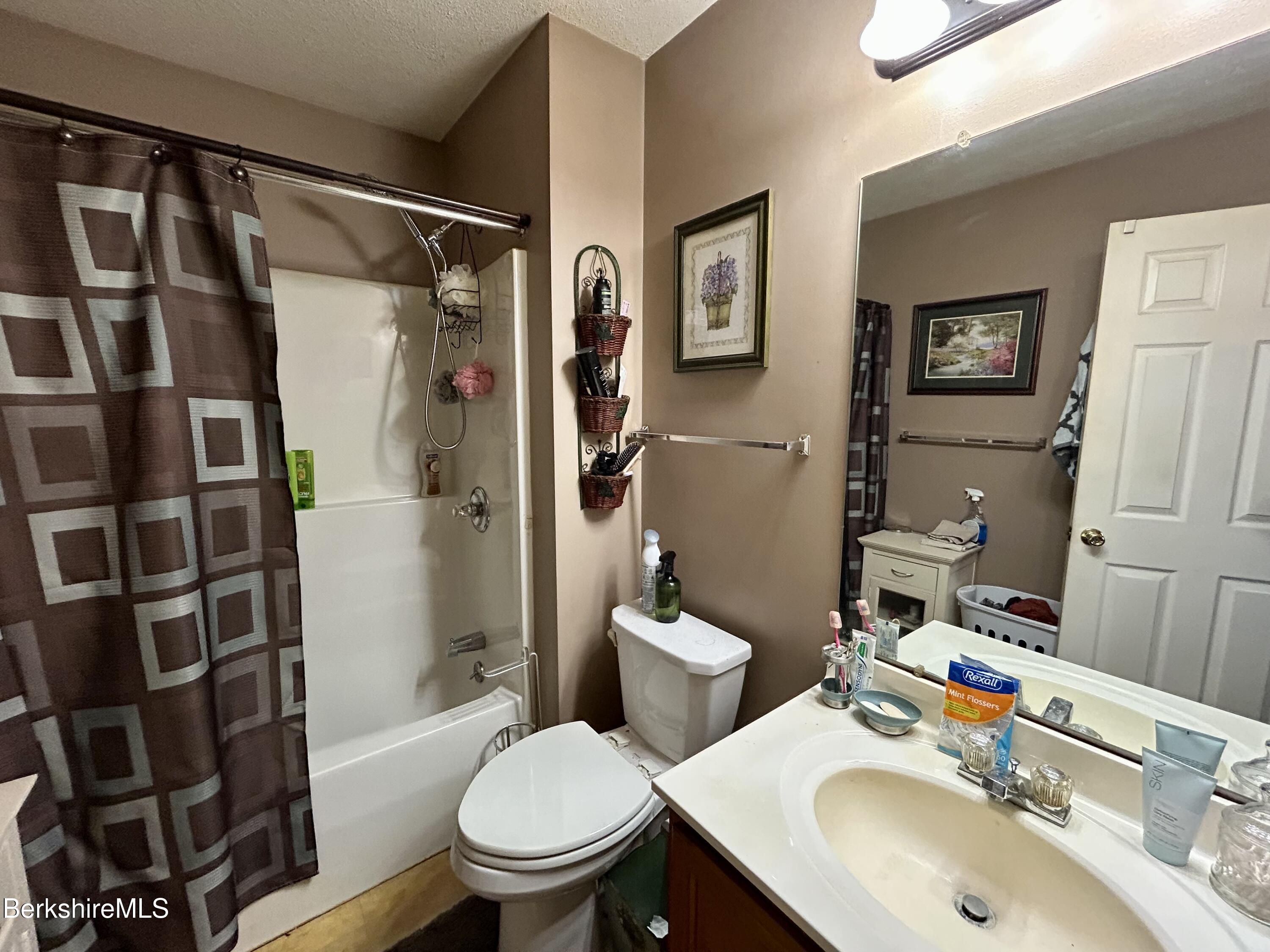 20 Richmond Way Chicopee, MA 01022 - Photo 17 of 25 a bathroom with a sink toilet and shower