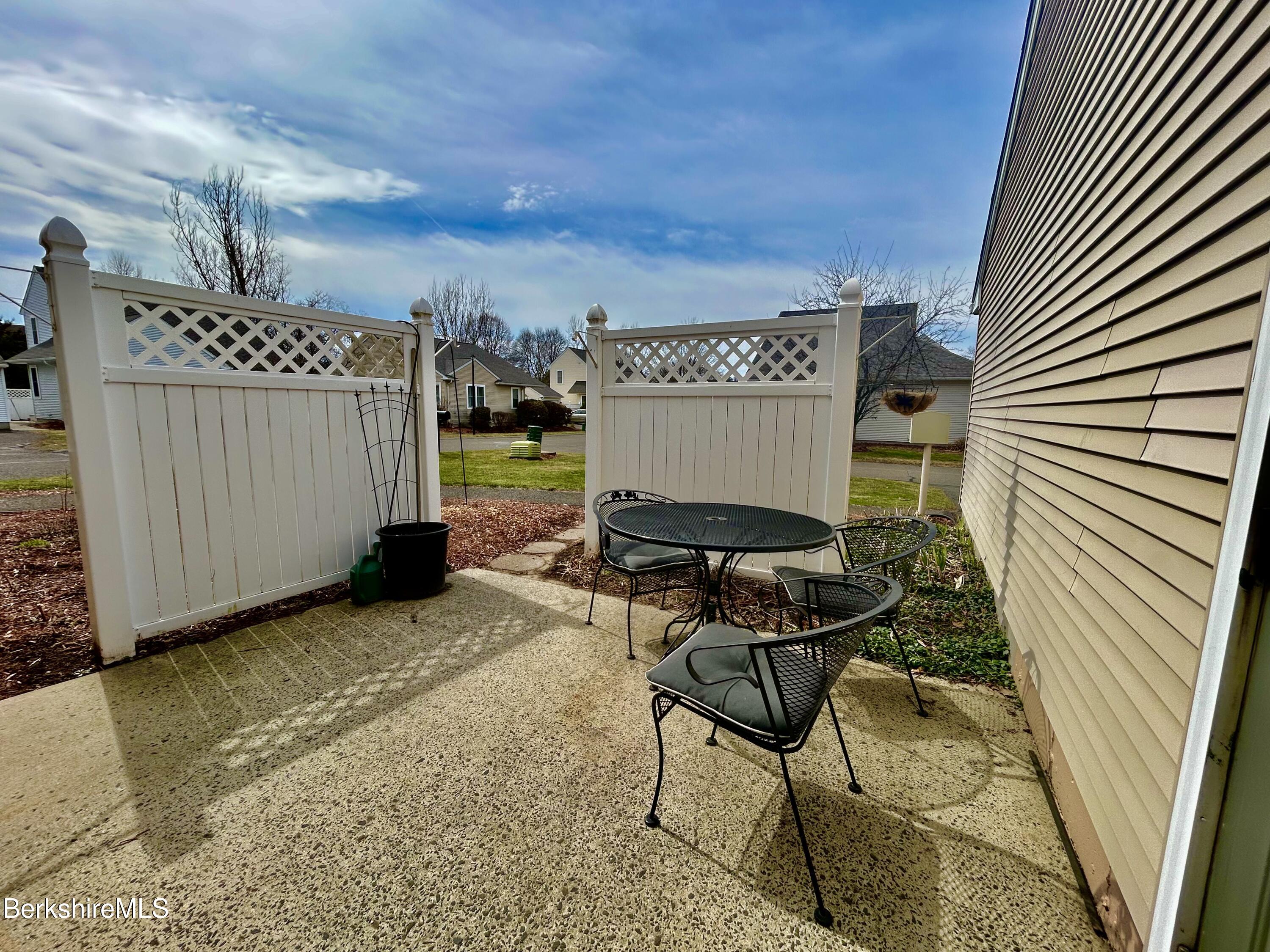 20 Richmond Way Chicopee, MA 01022 - Photo 19 of 25 a view of a chairs in patio