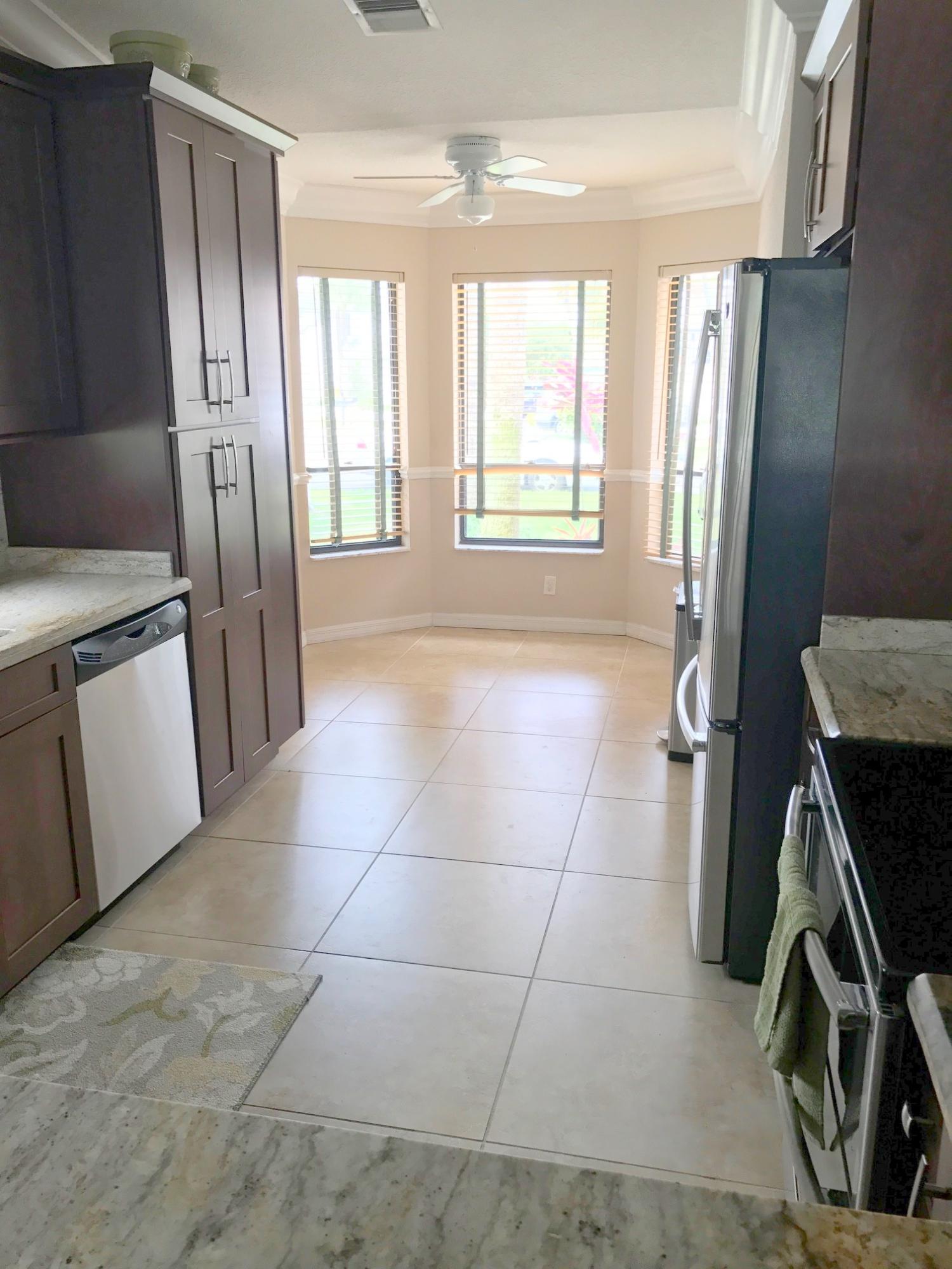 23350 Sedawie Drive Boca Raton, FL 33433 - Photo 3 of 30 View into kitchen