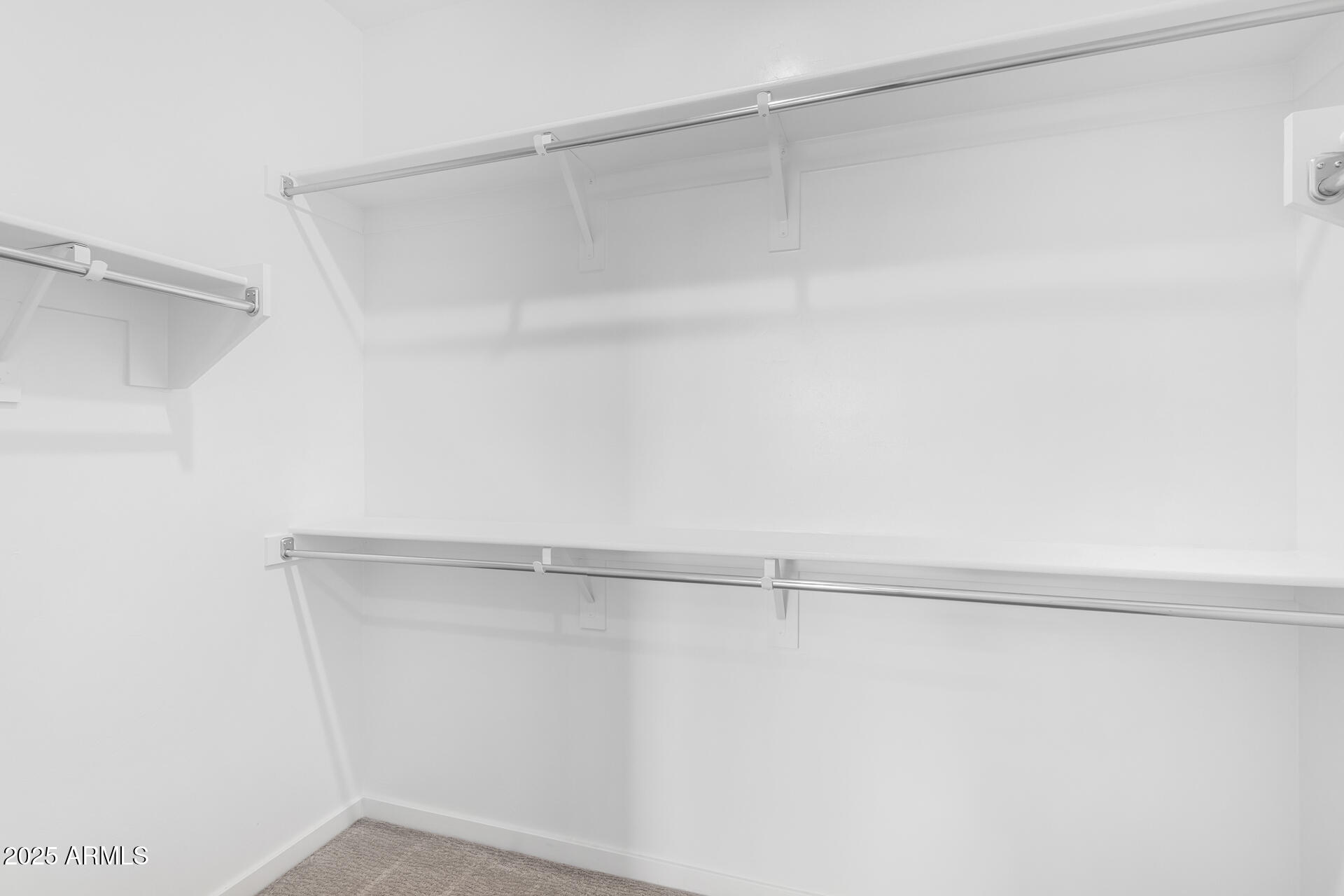 1848 South Follett Way Gilbert, AZ 85295 - Photo 15 of 32 a view of a room with racks on the wall