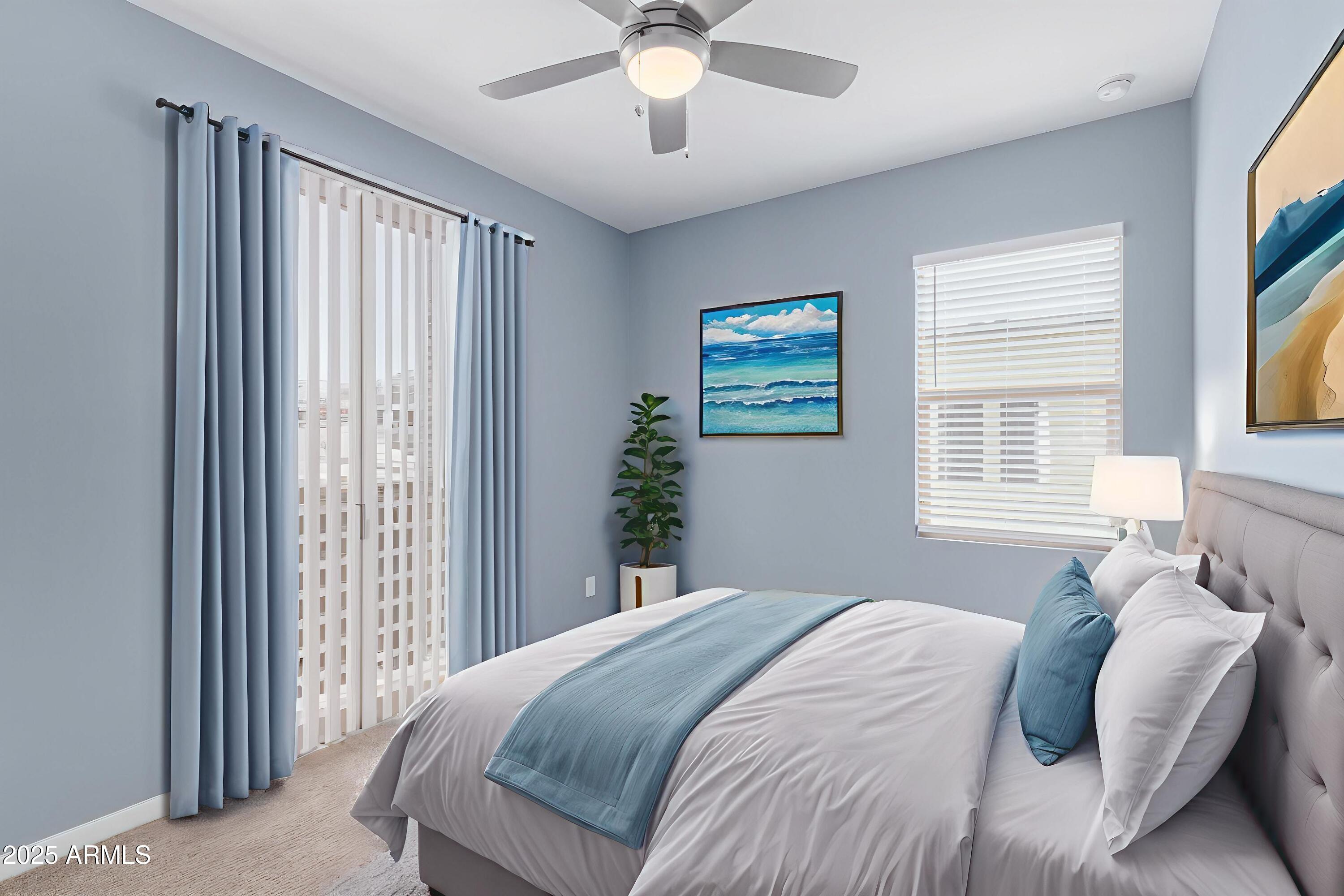 1848 South Follett Way Gilbert, AZ 85295 - Photo 18 of 32 a bedroom with a bed and a chandelier