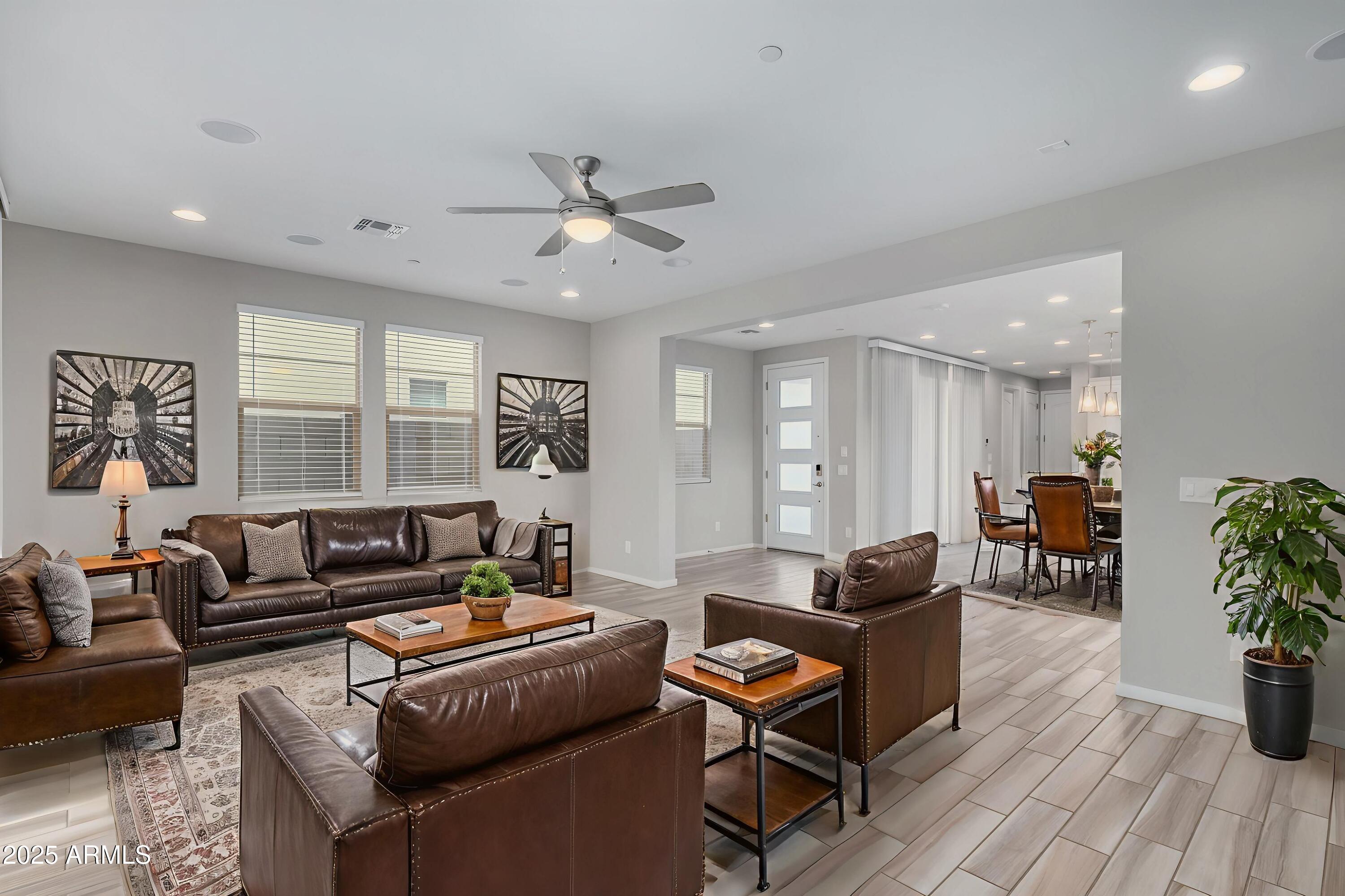 1848 South Follett Way Gilbert, AZ 85295 - Photo 5 of 32 a living room with furniture and wooden floor