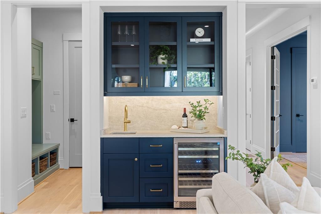 1140 Rosedale Drive Northeast Atlanta, GA 30306 - Photo 13 of 50 a living room with hard wood floors and cabinet