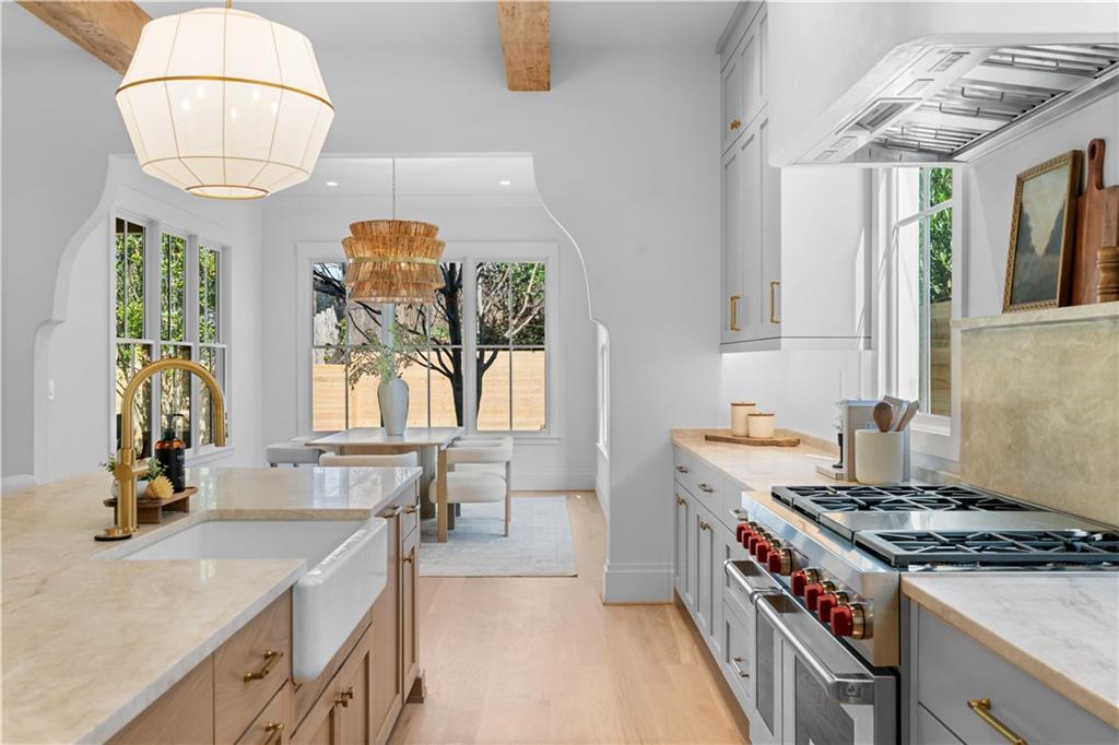 1140 Rosedale Drive Northeast Atlanta, GA 30306 - Photo 18 of 50 a kitchen with a stove and a sink