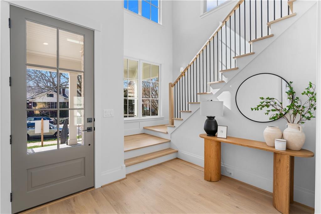 1140 Rosedale Drive Northeast Atlanta, GA 30306 - Photo 2 of 50 a view of entryway and hall with wooden floor