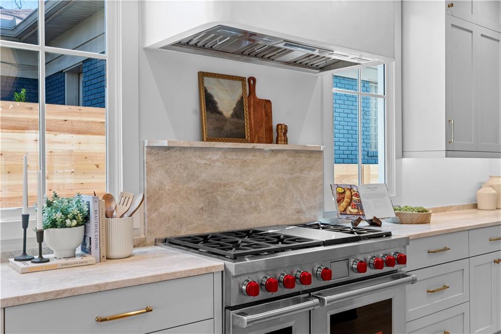 1140 Rosedale Drive Northeast Atlanta, GA 30306 - Photo 22 of 50 a kitchen with a stove and a potted plant