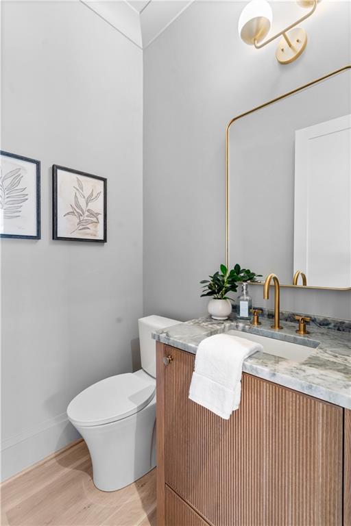 1140 Rosedale Drive Northeast Atlanta, GA 30306 - Photo 27 of 50 a bathroom with a granite countertop sink a toilet and mirror