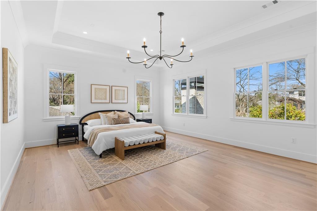 1140 Rosedale Drive Northeast Atlanta, GA 30306 - Photo 28 of 50 a bed room with a bed mirror and a window
