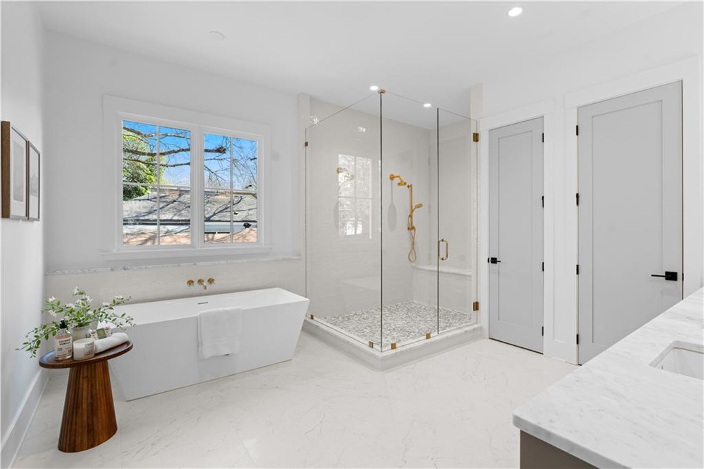 1140 Rosedale Drive Northeast Atlanta, GA 30306 - Photo 31 of 50 a bathroom with a tub sink shower and mirror