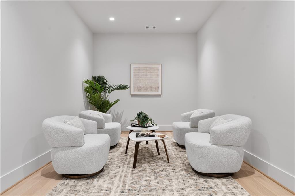 1140 Rosedale Drive Northeast Atlanta, GA 30306 - Photo 41 of 50 a living room with furniture and a potted plant