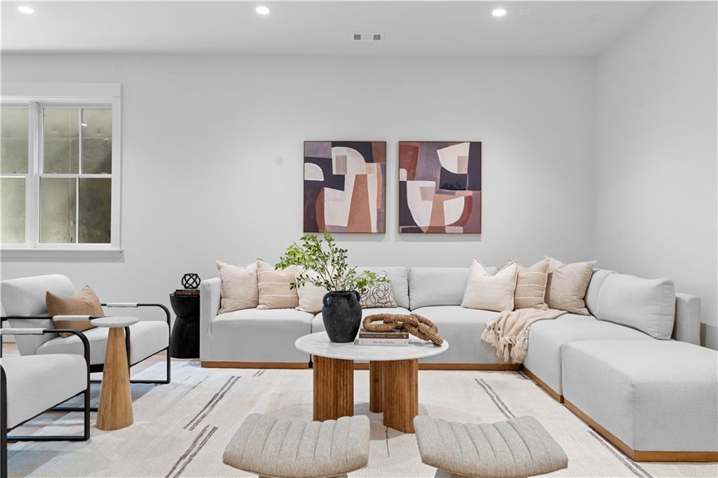 1140 Rosedale Drive Northeast Atlanta, GA 30306 - Photo 43 of 50 a living room with furniture and wall painting