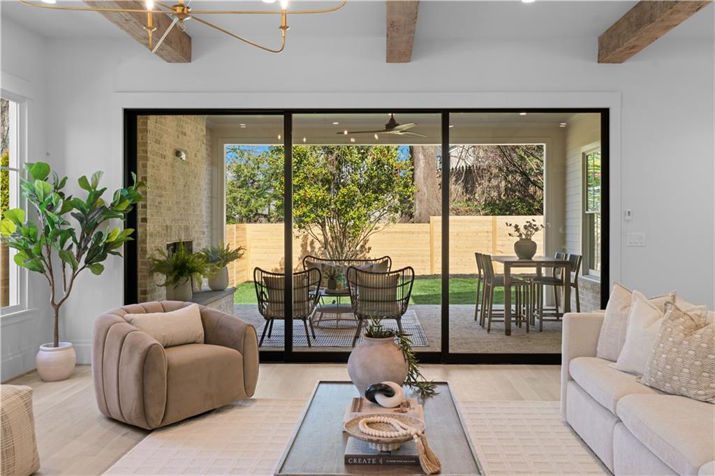 1140 Rosedale Drive Northeast Atlanta, GA 30306 - Photo 7 of 50 a living room with furniture and a large window