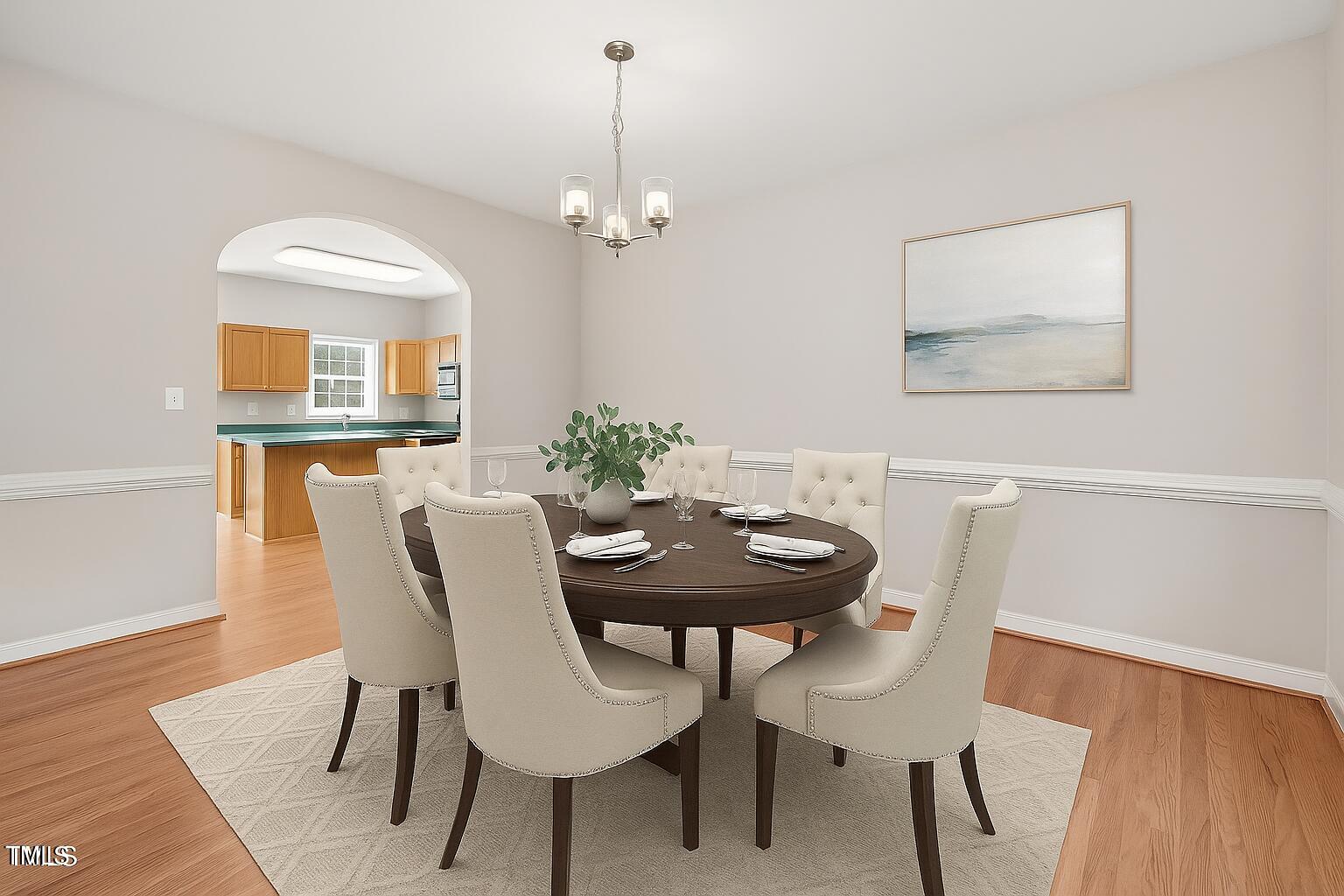 1909 Redding Lane Durham, NC 27712 - Photo 14 of 49 a view of a dining room with furniture and wooden floor