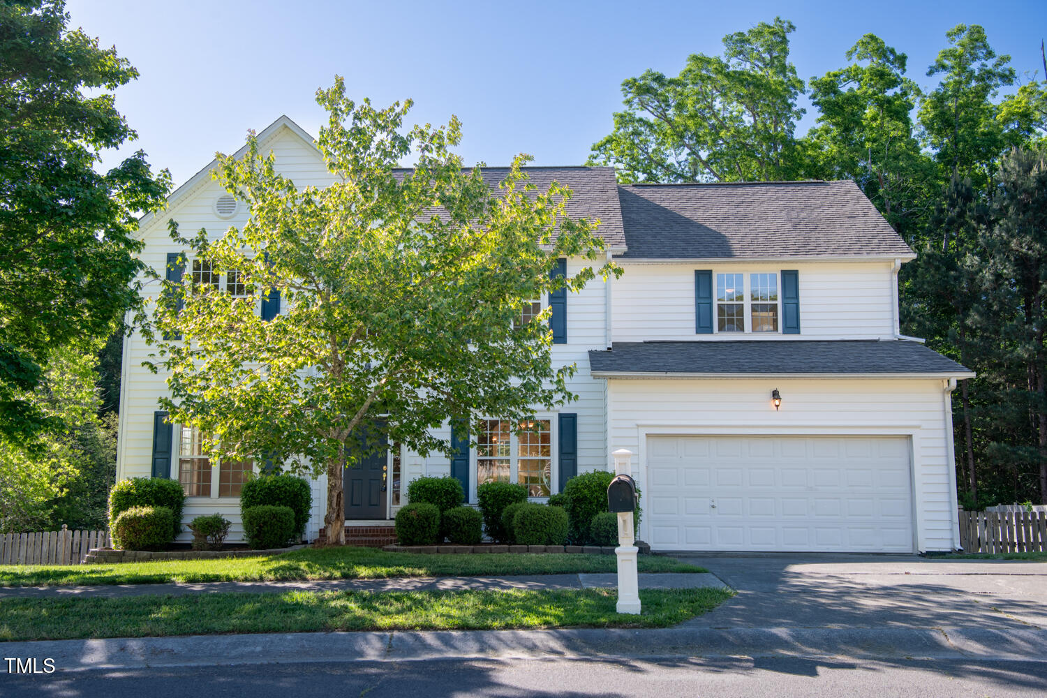 1909 Redding Lane Durham, NC 27712 - Photo 2 of 49 front view of a house with a street