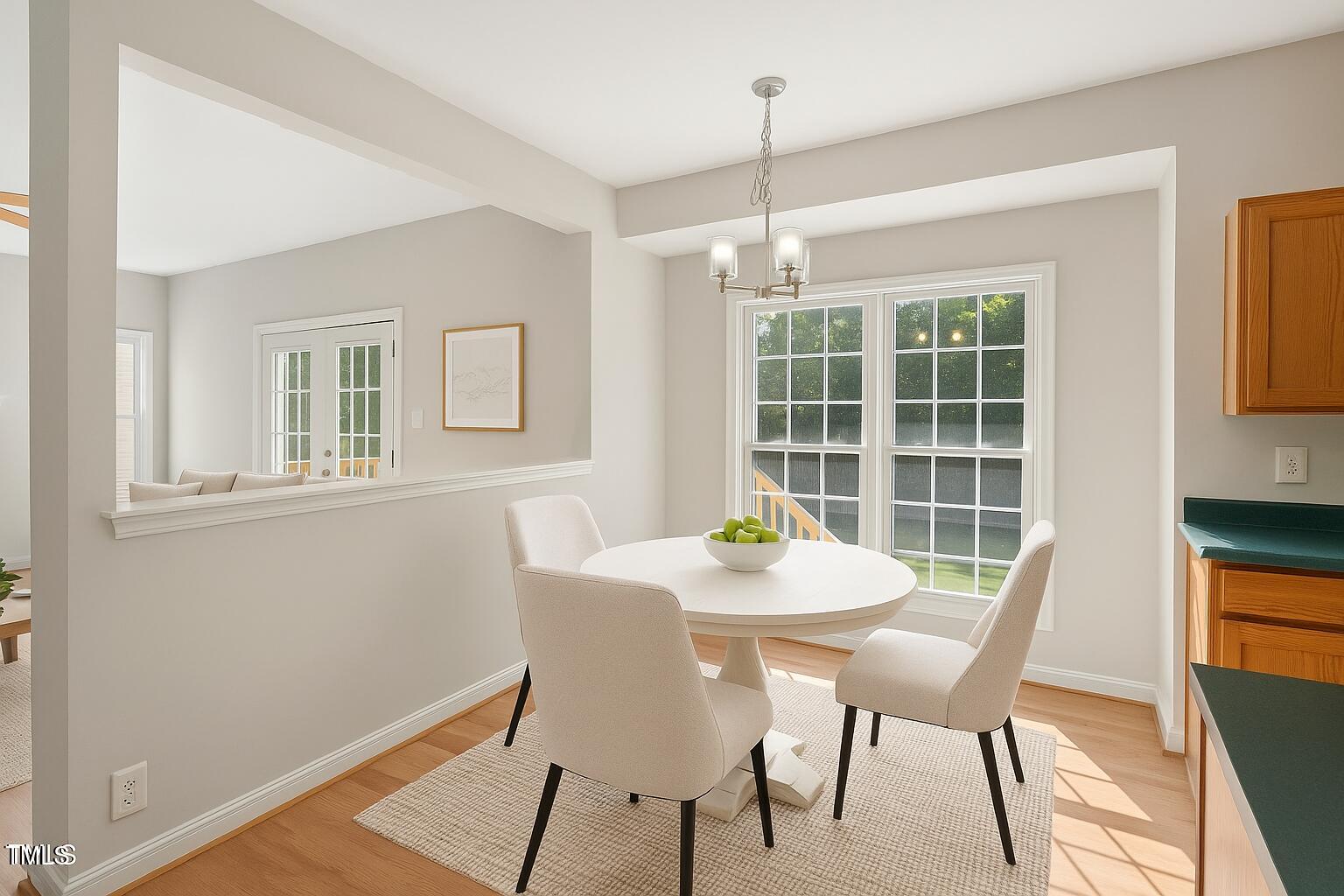1909 Redding Lane Durham, NC 27712 - Photo 23 of 49 a view of a dining room with furniture window and outside view