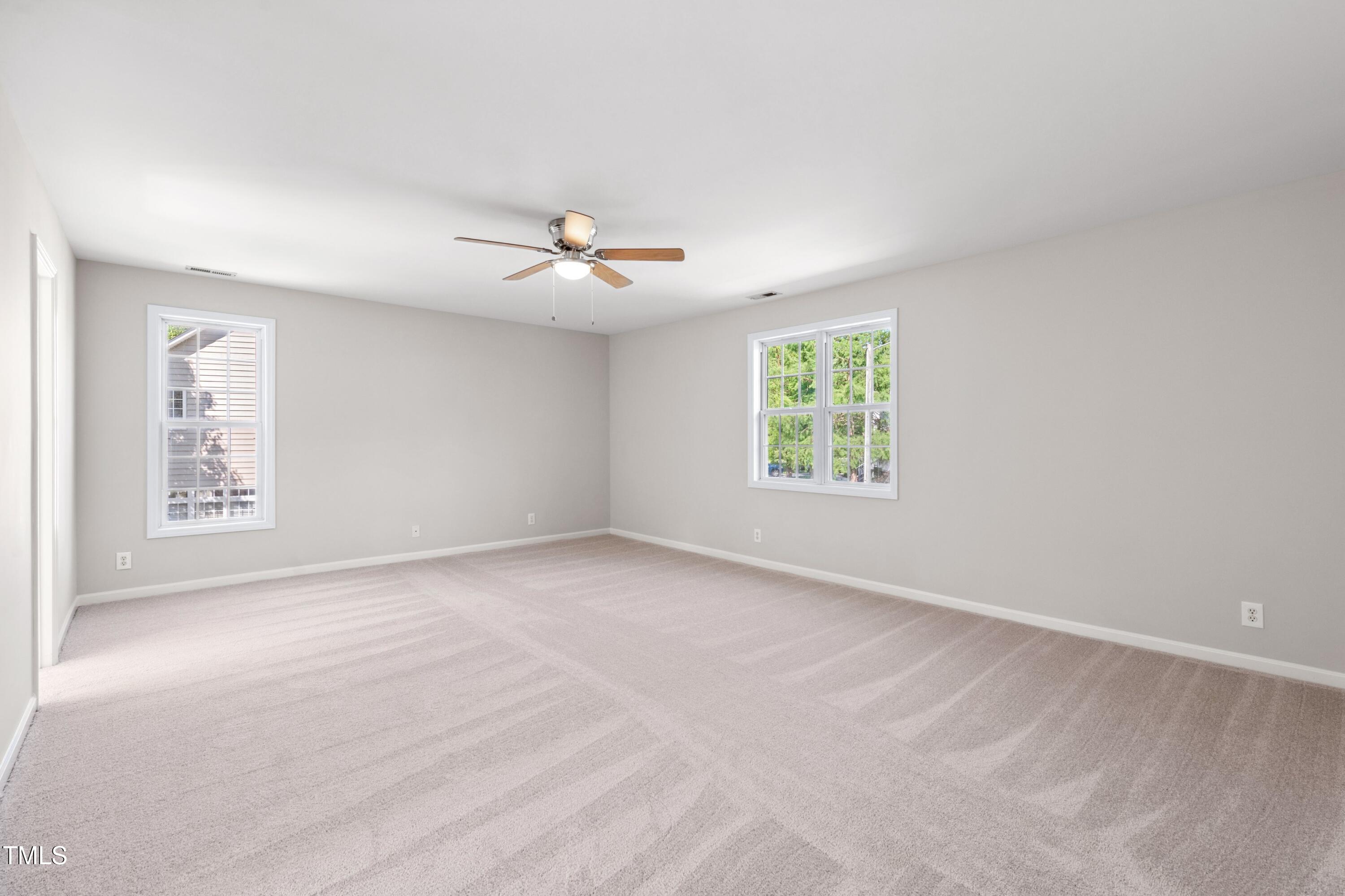 1909 Redding Lane Durham, NC 27712 - Photo 33 of 49 a view of an empty room with a window