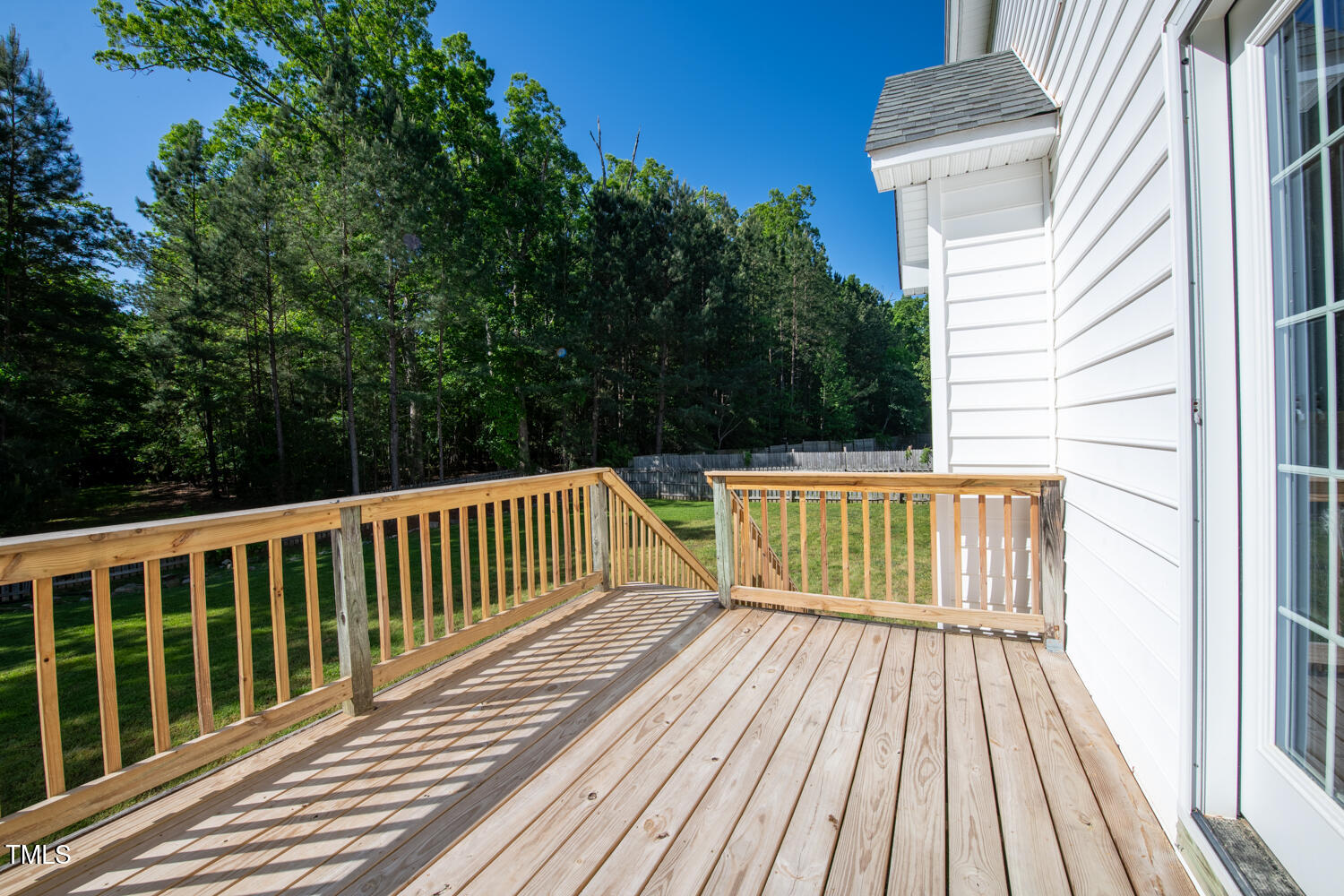 1909 Redding Lane Durham, NC 27712 - Photo 45 of 49 a view of balcony with wooden floor