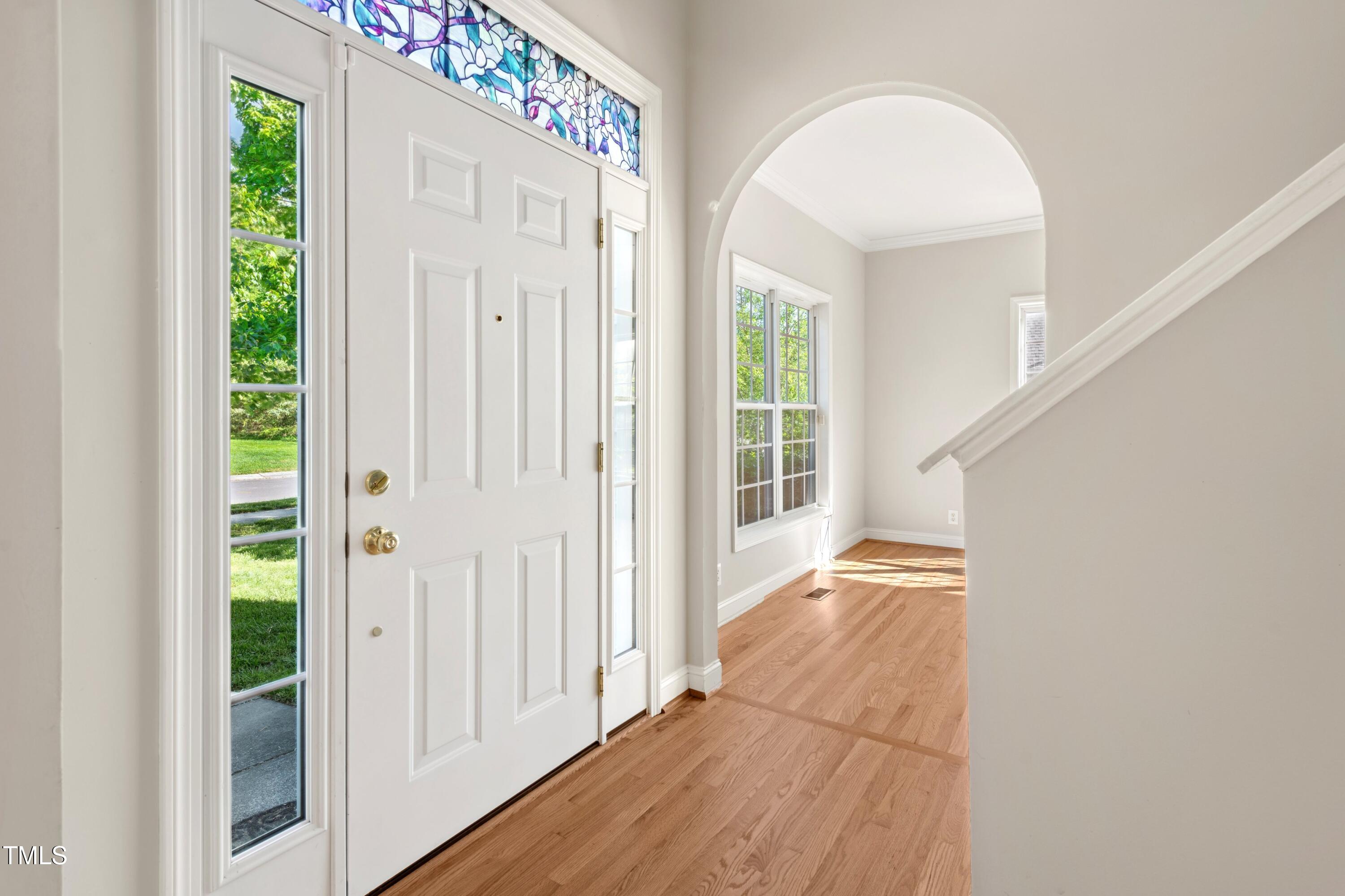 1909 Redding Lane Durham, NC 27712 - Photo 9 of 49 a view of a hallway with wooden floor and entryway