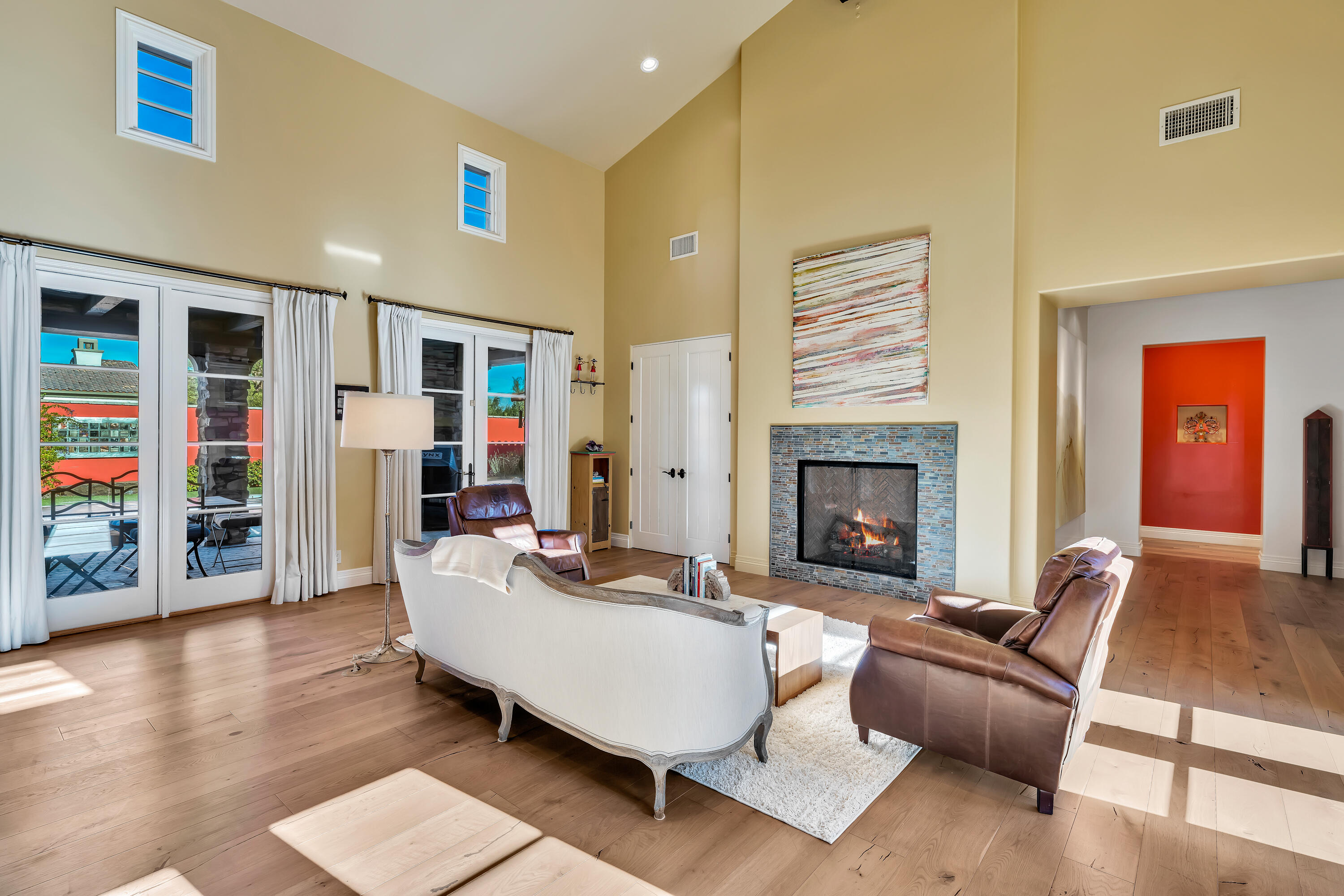 37 Cassis Circle Rancho Mirage, CA 92270 - Photo 11 of 56 a living room with furniture and a fireplace
