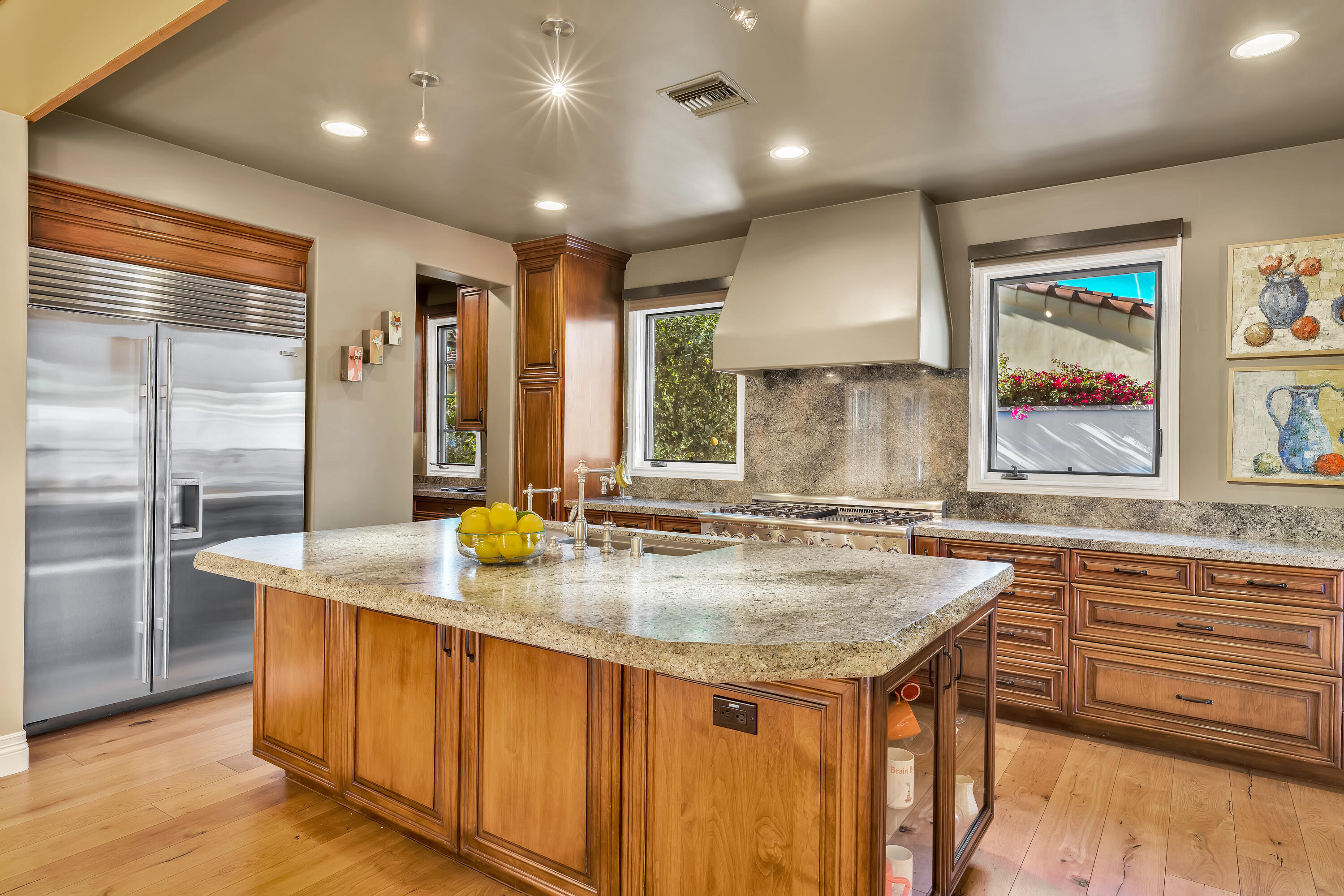 37 Cassis Circle Rancho Mirage, CA 92270 - Photo 17 of 56 a kitchen with sink a counter top space and stainless steel appliances