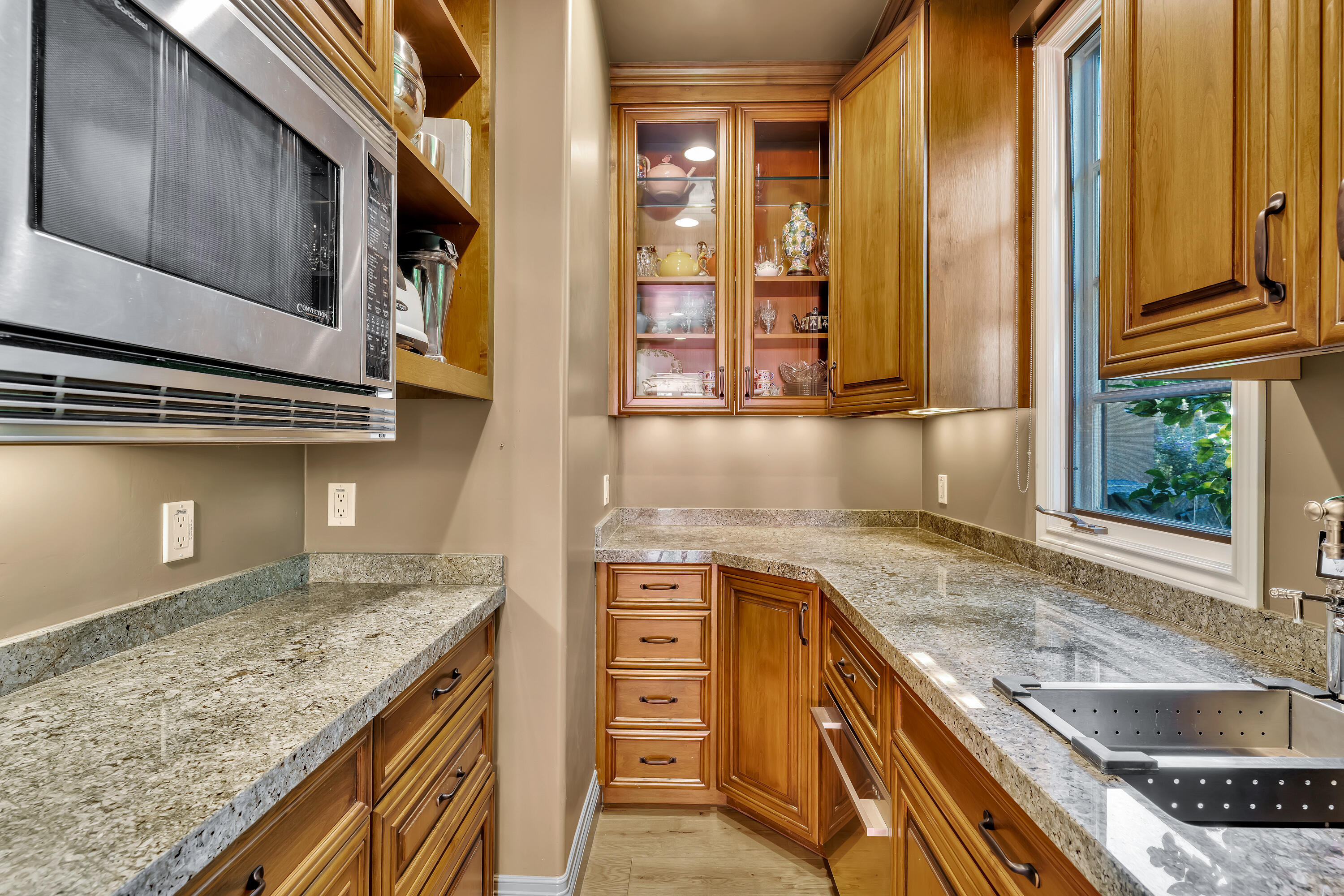 37 Cassis Circle Rancho Mirage, CA 92270 - Photo 19 of 56 a kitchen with granite countertop a sink and a stove