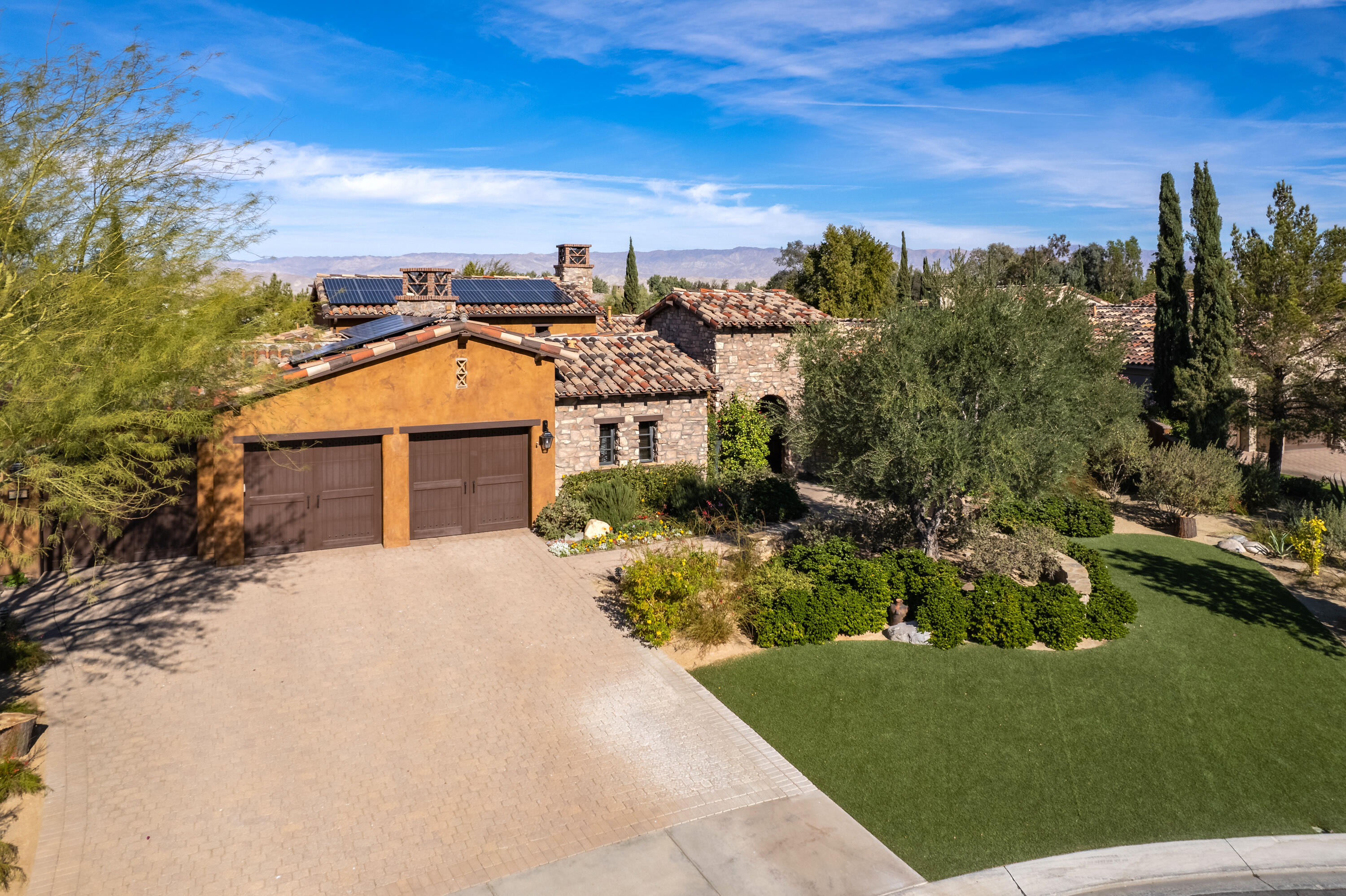 37 Cassis Circle Rancho Mirage, CA 92270 - Photo 3 of 56 a view of a house with a yard
