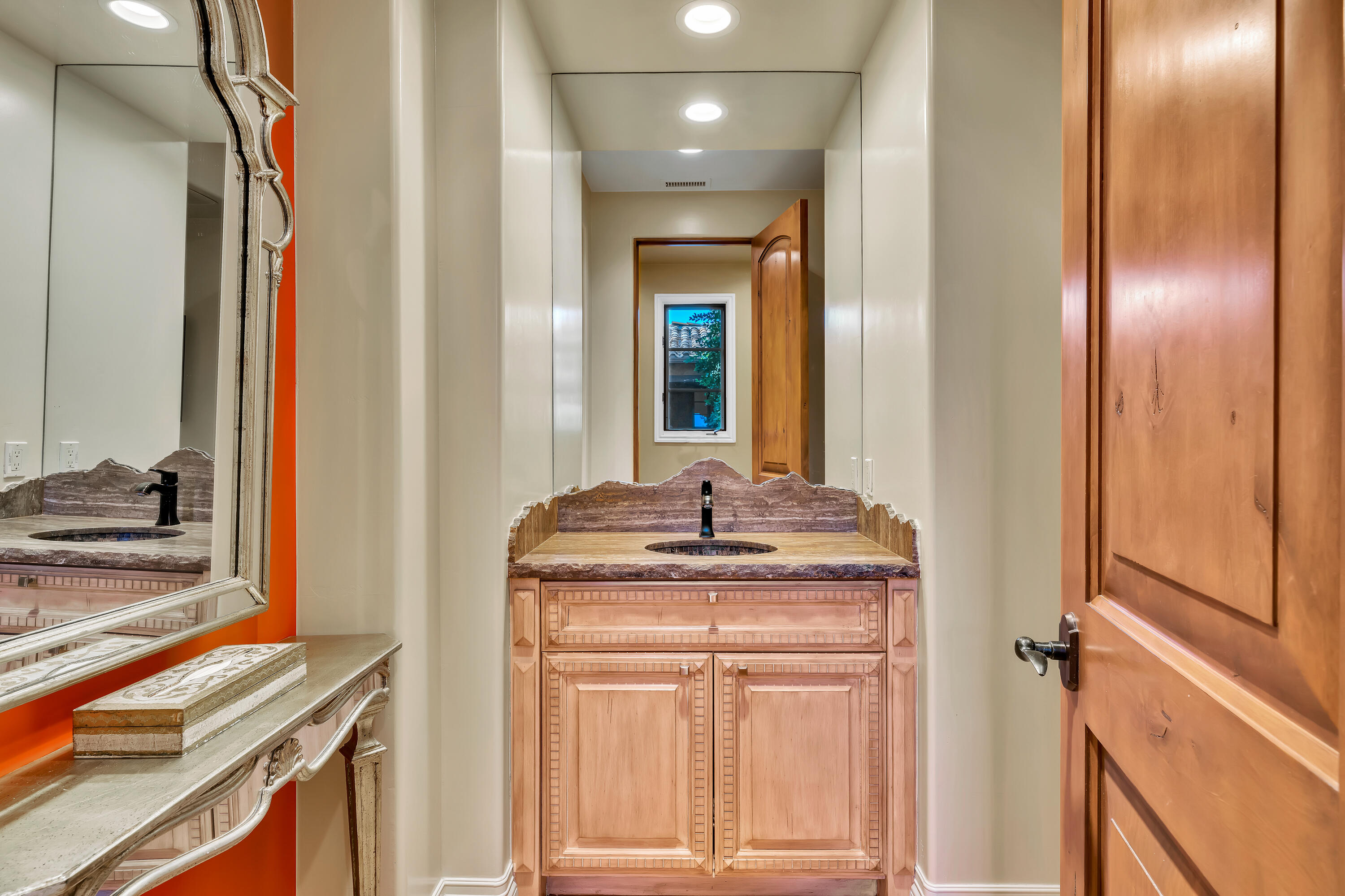 37 Cassis Circle Rancho Mirage, CA 92270 - Photo 23 of 56 a bathroom with a granite countertop sink and a mirror