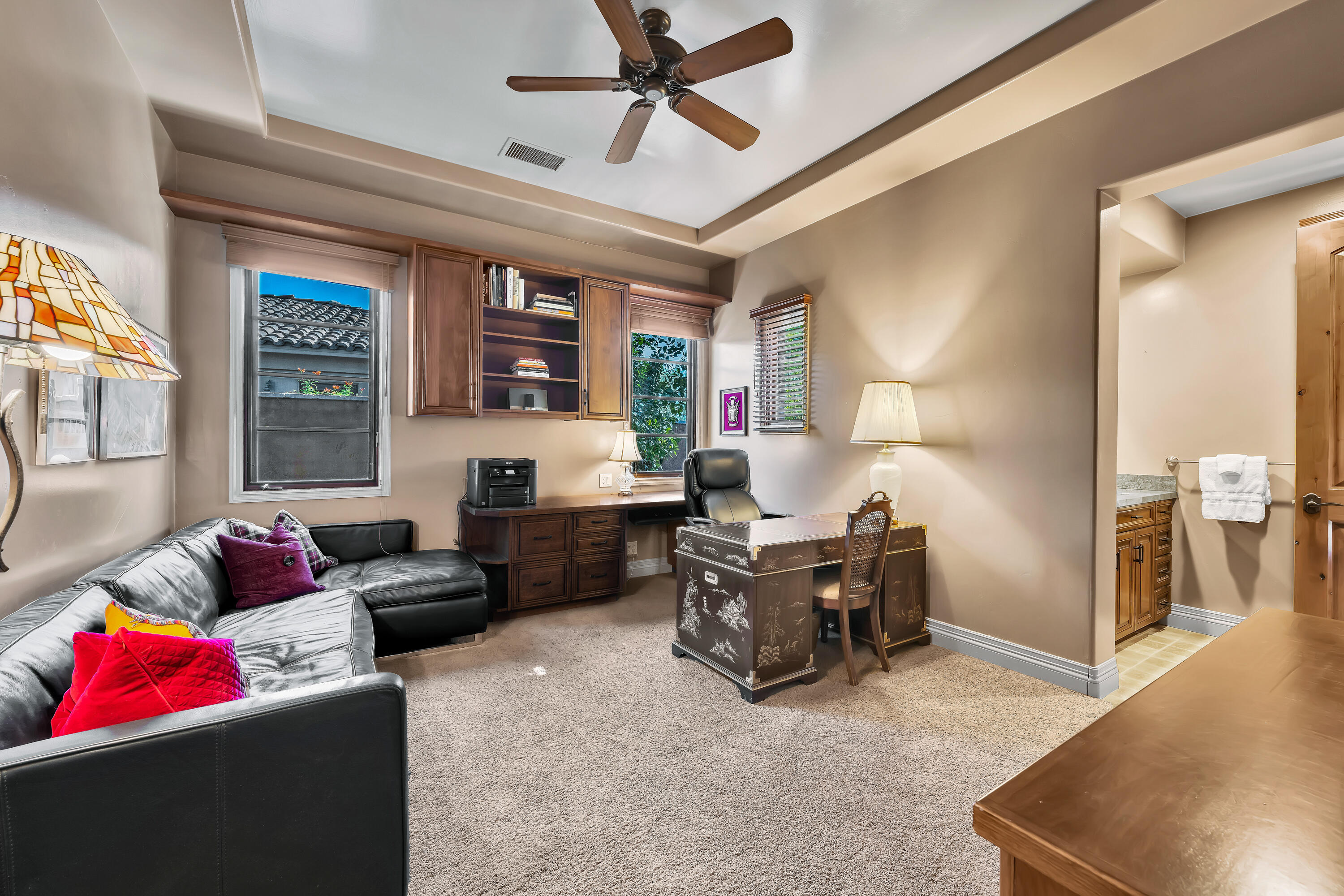37 Cassis Circle Rancho Mirage, CA 92270 - Photo 32 of 56 a living room with furniture and a flat screen tv