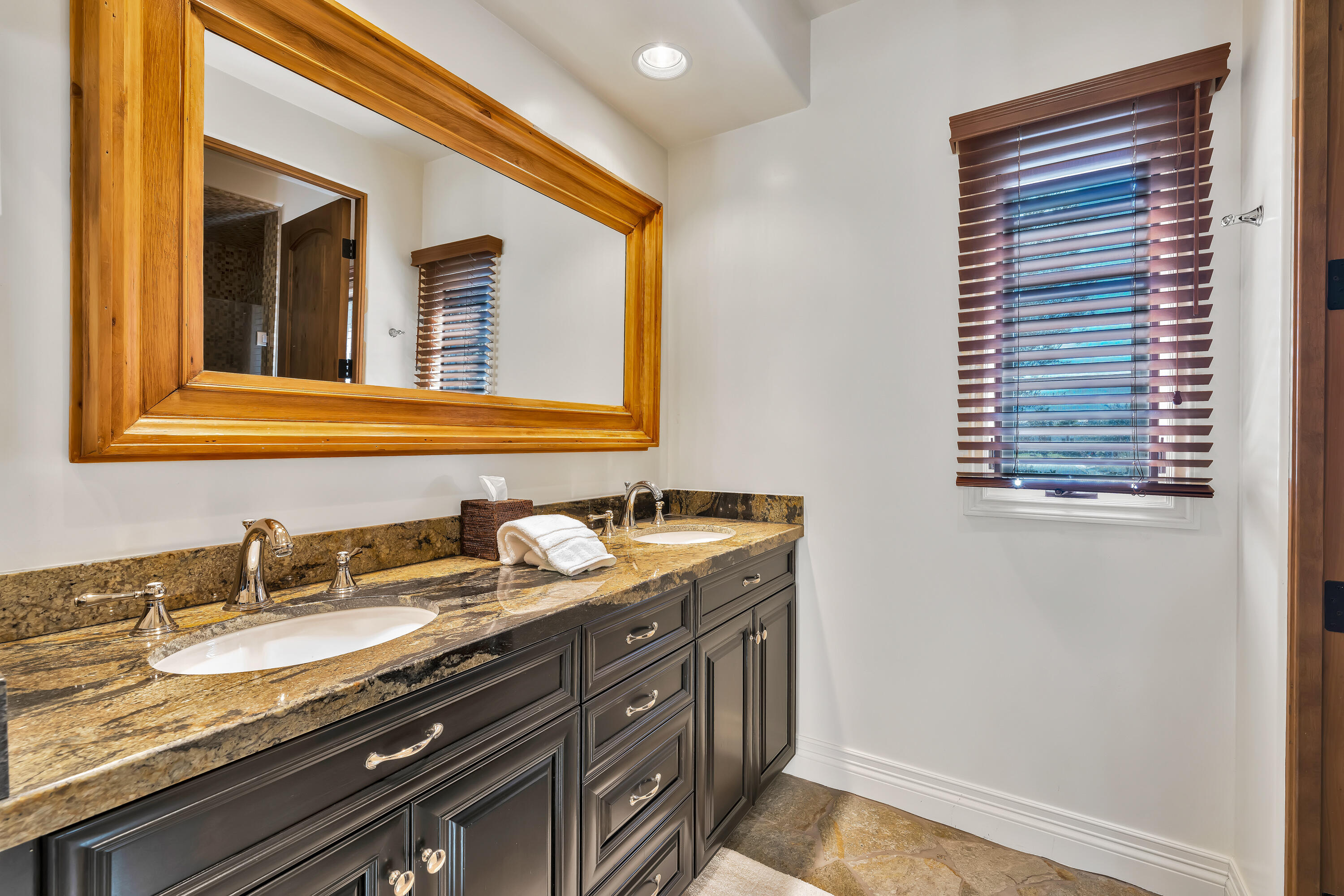 37 Cassis Circle Rancho Mirage, CA 92270 - Photo 40 of 56 a bathroom with a granite countertop sink and a mirror