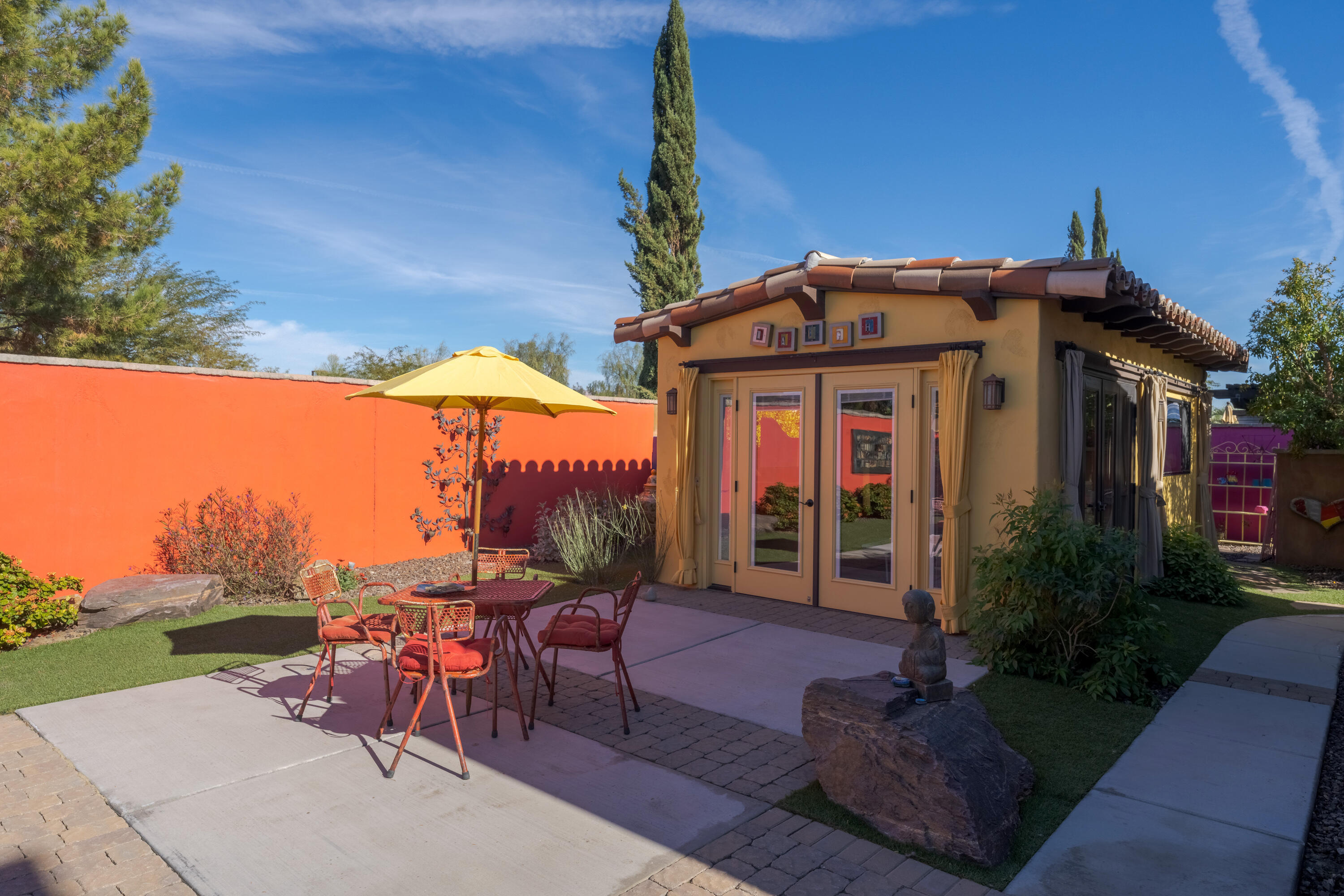 37 Cassis Circle Rancho Mirage, CA 92270 - Photo 44 of 56 a front view of a house with garden