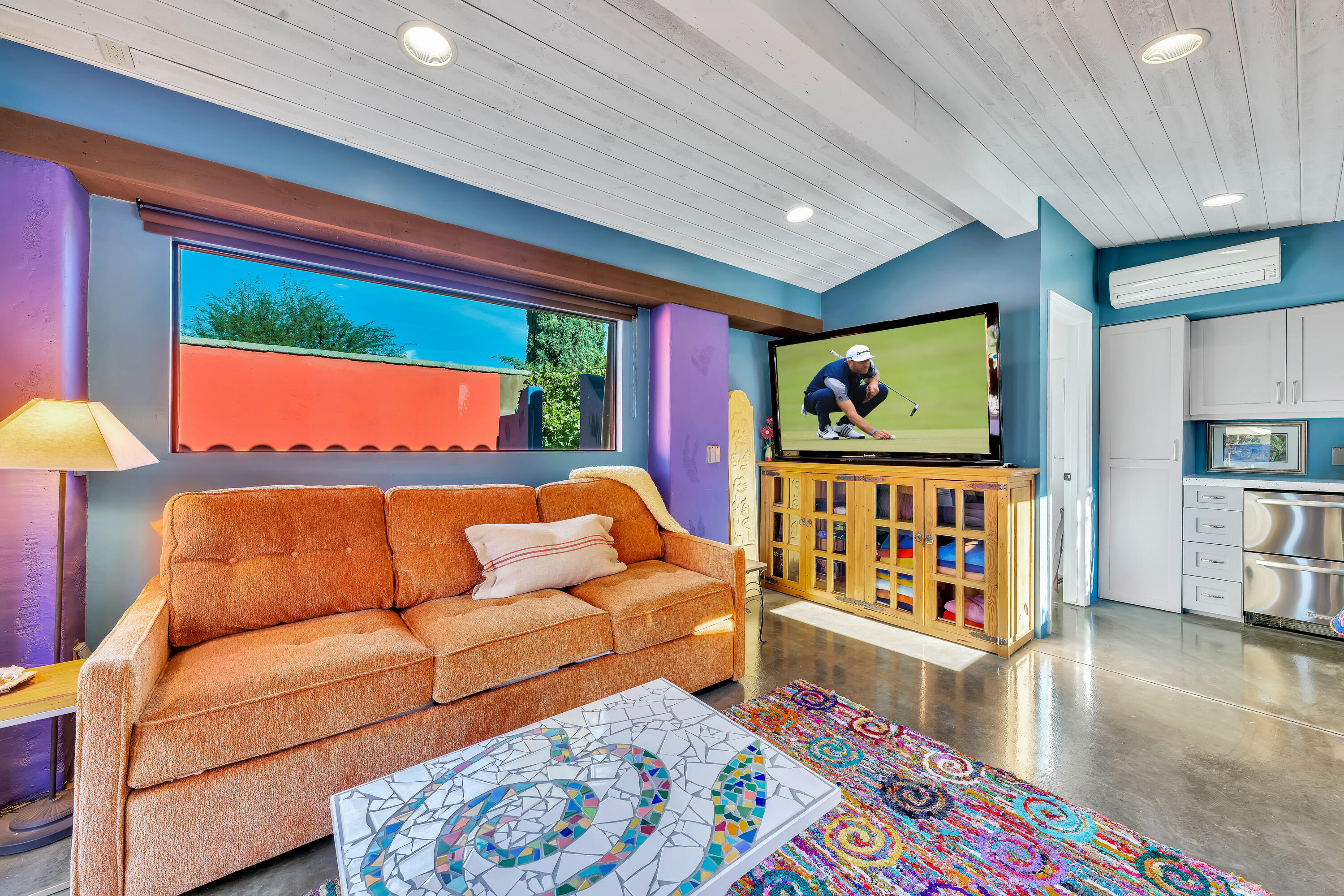 37 Cassis Circle Rancho Mirage, CA 92270 - Photo 45 of 56 a living room with furniture and a flat screen tv
