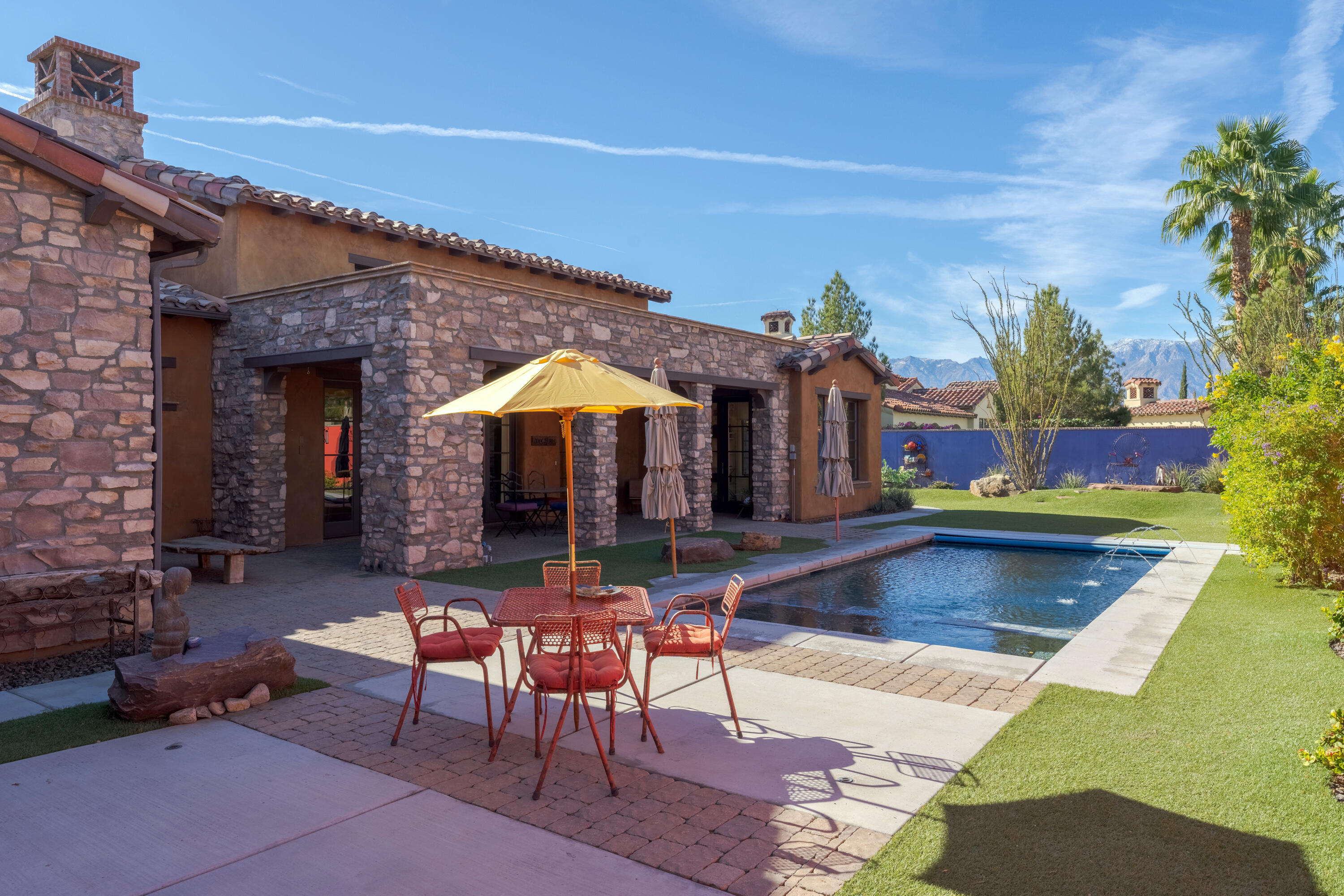 37 Cassis Circle Rancho Mirage, CA 92270 - Photo 51 of 56 a view of a house with swimming pool and sitting area