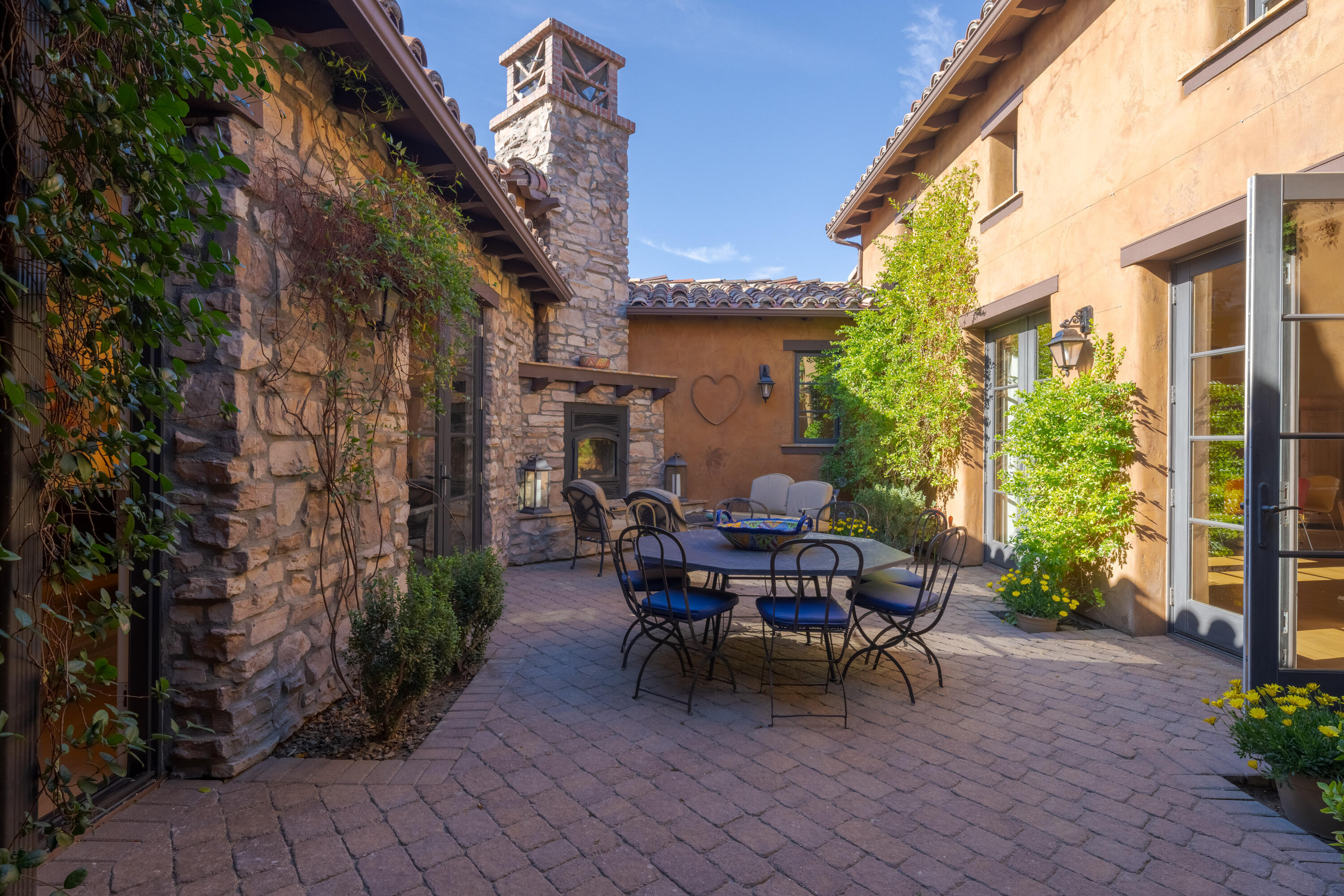 37 Cassis Circle Rancho Mirage, CA 92270 - Photo 7 of 56 a view of a patio with a table and chairs