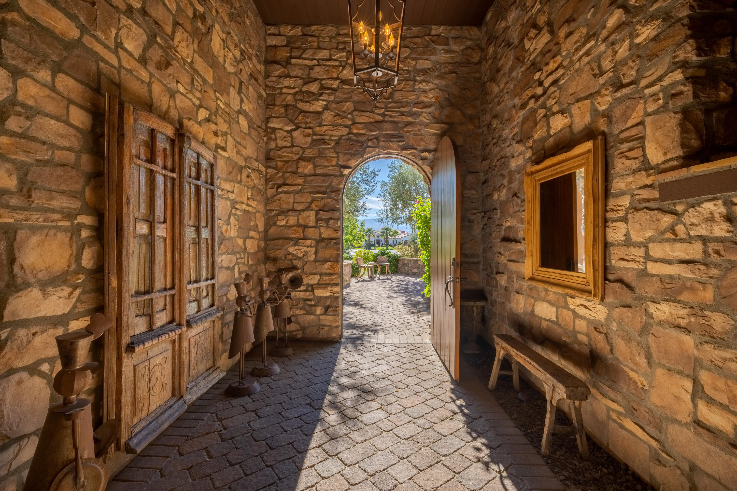 37 Cassis Circle Rancho Mirage, CA 92270 - Photo 9 of 56 a view of a pathway both side of building