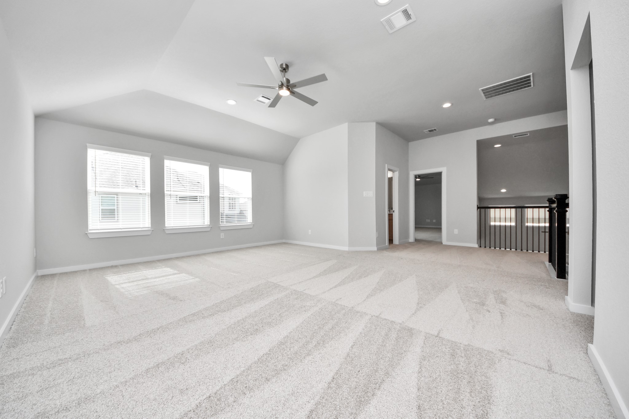3109 North Spring Drive Spring, TX 77373 - Photo 31 of 50 Ascend to relaxation in this fantastic game room! Ideal for both casual gatherings and adult gaming, it boasts plush carpet, lofty ceilings, custom paint, and ample windows for abundant natural light