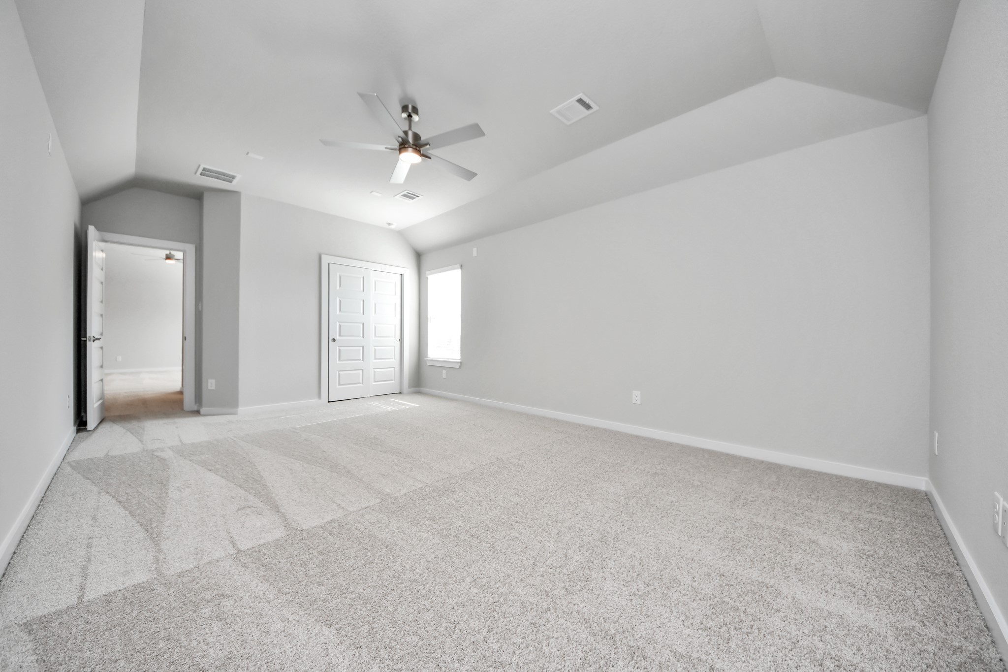 3109 North Spring Drive Spring, TX 77373 - Photo 33 of 50 Generously sized secondary bedrooms featuring spacious closets, soft and inviting carpeting underfoot, large windows allowing plenty of natural light, and the added touch of privacy blinds for your personal retreat.