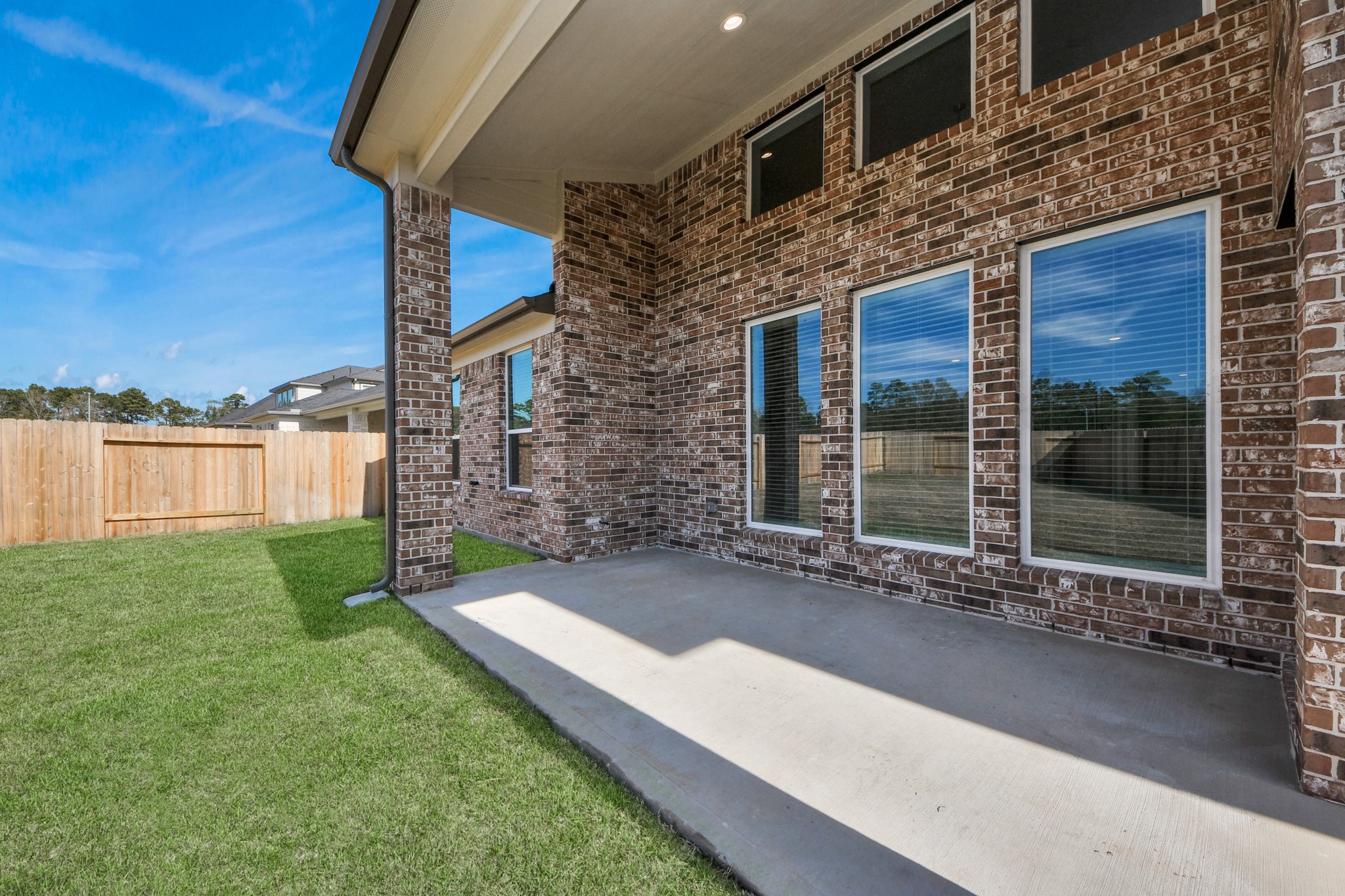 3109 North Spring Drive Spring, TX 77373 - Photo 44 of 50 Experience outdoor living at its finest on this expansive covered patio, thoughtfully designed for BBQs and delightful outdoor dining.