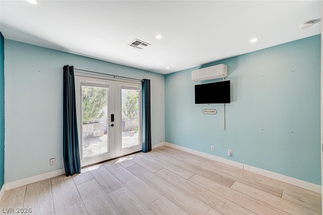 4153 Woodcrest Road Las Vegas, NV 89121 - Photo 33 of 58 French doors provide a delightful entry point and natural light into this spacious interior.