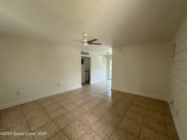 en empty room with windows