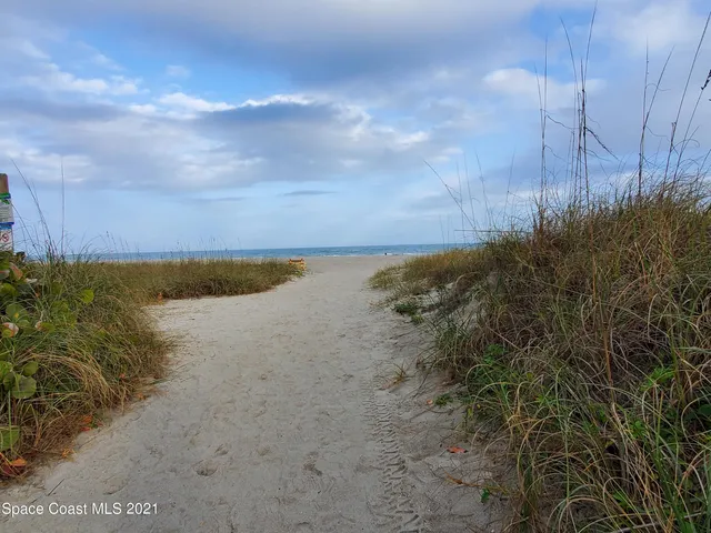 a view of beach and lake