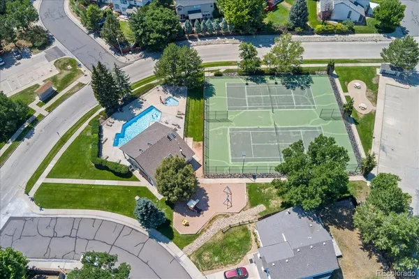 an aerial view of a house with a lake view