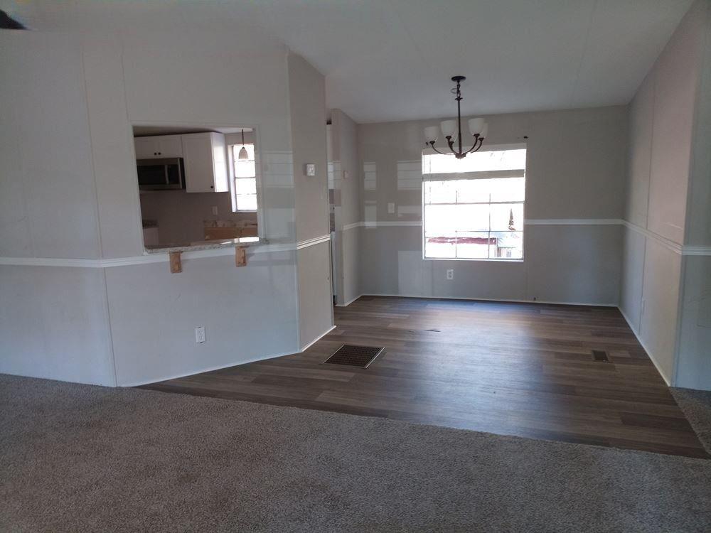 265 Perry Lane Buchanan, GA 30113 - Photo 15 of 20 a view of a livingroom with wooden floor and a window