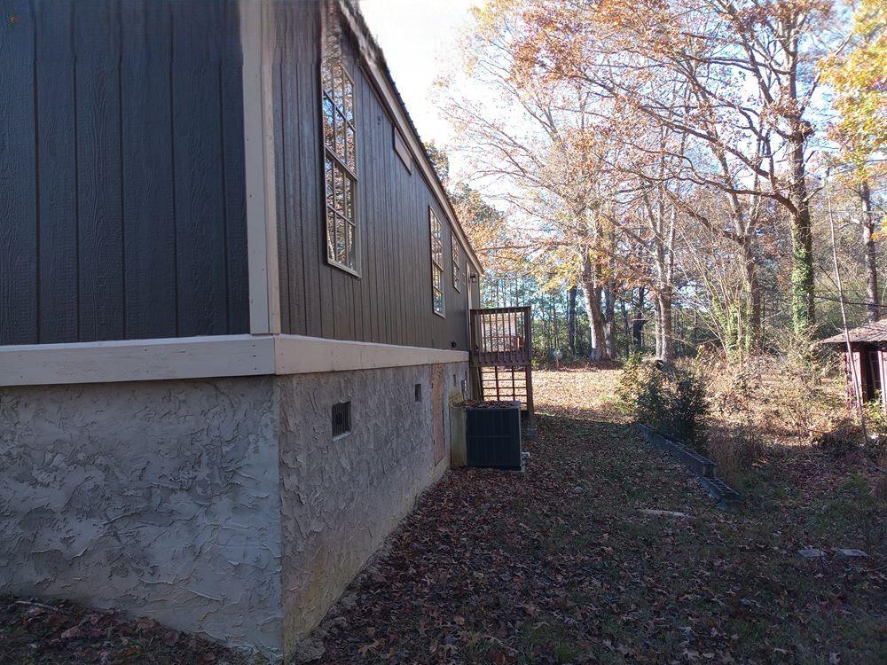 265 Perry Lane Buchanan, GA 30113 - Photo 7 of 20 a view of backyard with large trees