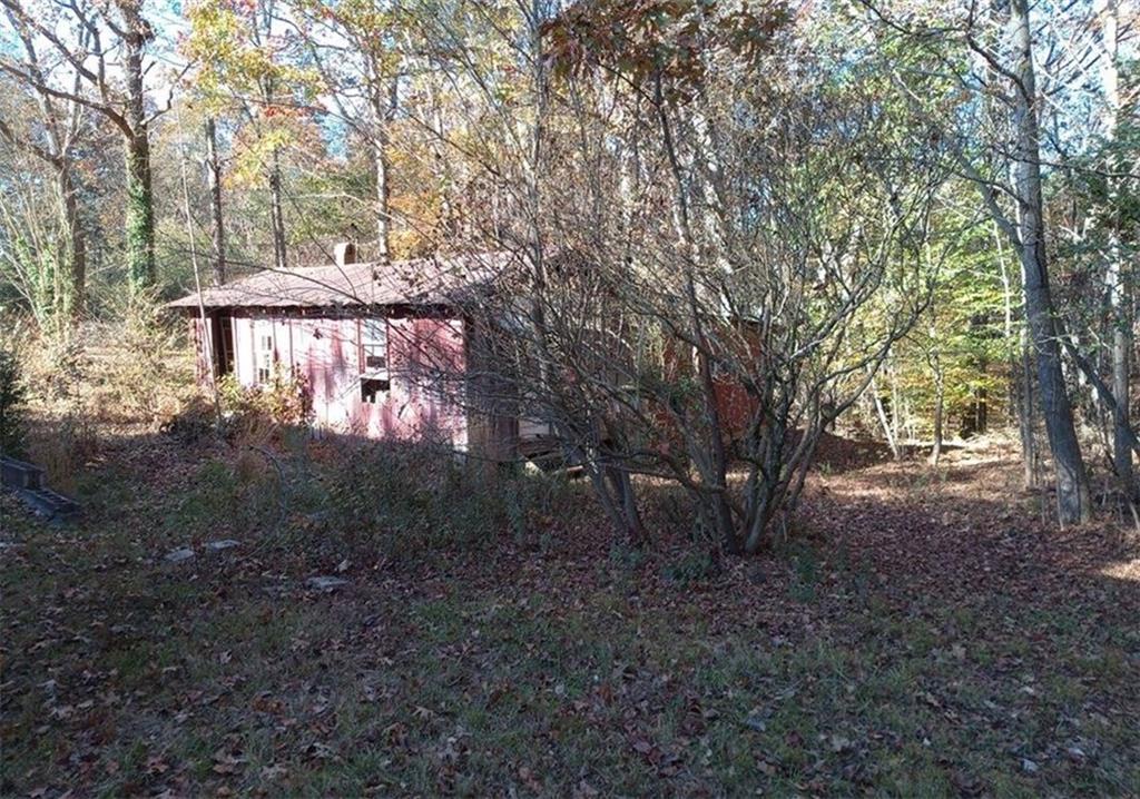 265 Perry Lane Buchanan, GA 30113 - Photo 8 of 20 a view of a house with a yard