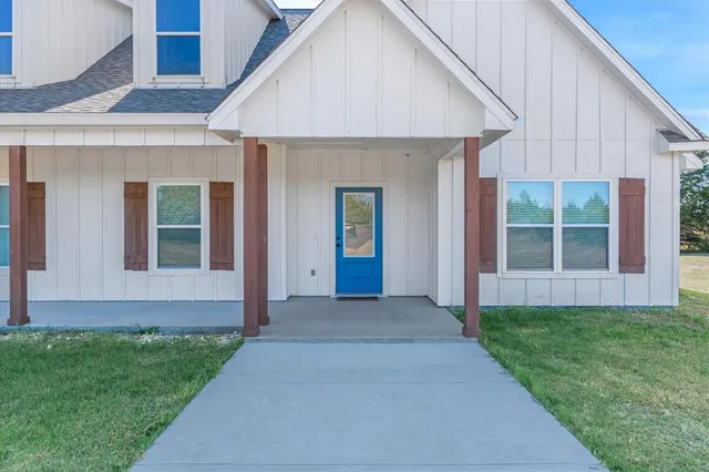 a view of livingroom with furniture and wooden floor