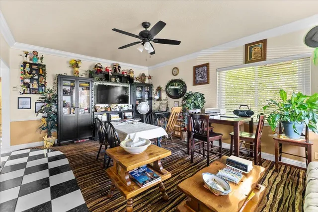 a kitchen with stainless steel appliances a stove a sink and a cabinets